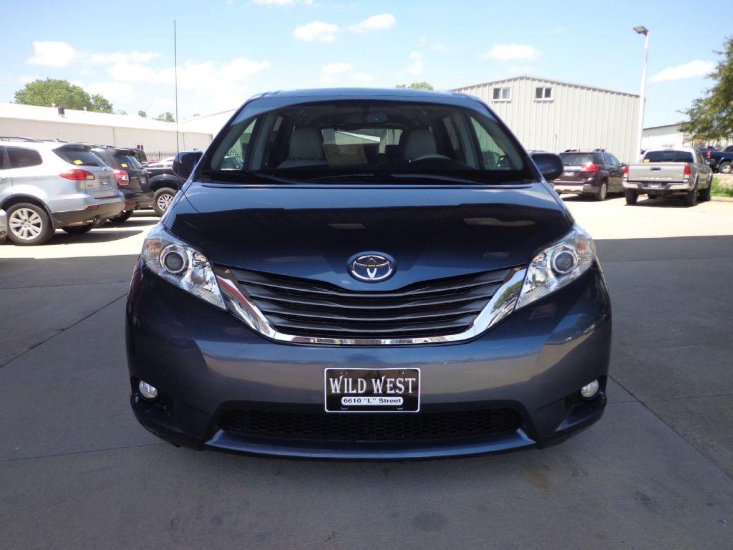 2014 BLUE TOYOTA SIENNA LIMITED (5TDYK3DC7ES) with an 3.5L engine, Automatic transmission, located at 6610 L St., Omaha, NE, 68117, (402) 731-7800, 41.212872, -96.014702 - THIS VEHICLE HAS A CLEAN TITLE WITH A FREE CARFAX PROVIDED! 1-OWNER, CLEAN CARFAX, LOW MILEAGE WITH NEWER TIRES! *****We have found that most customers do the majority of their shopping online before visiting a dealership. For this reason we feel it necessary to have a competitive price on our - Photo#1