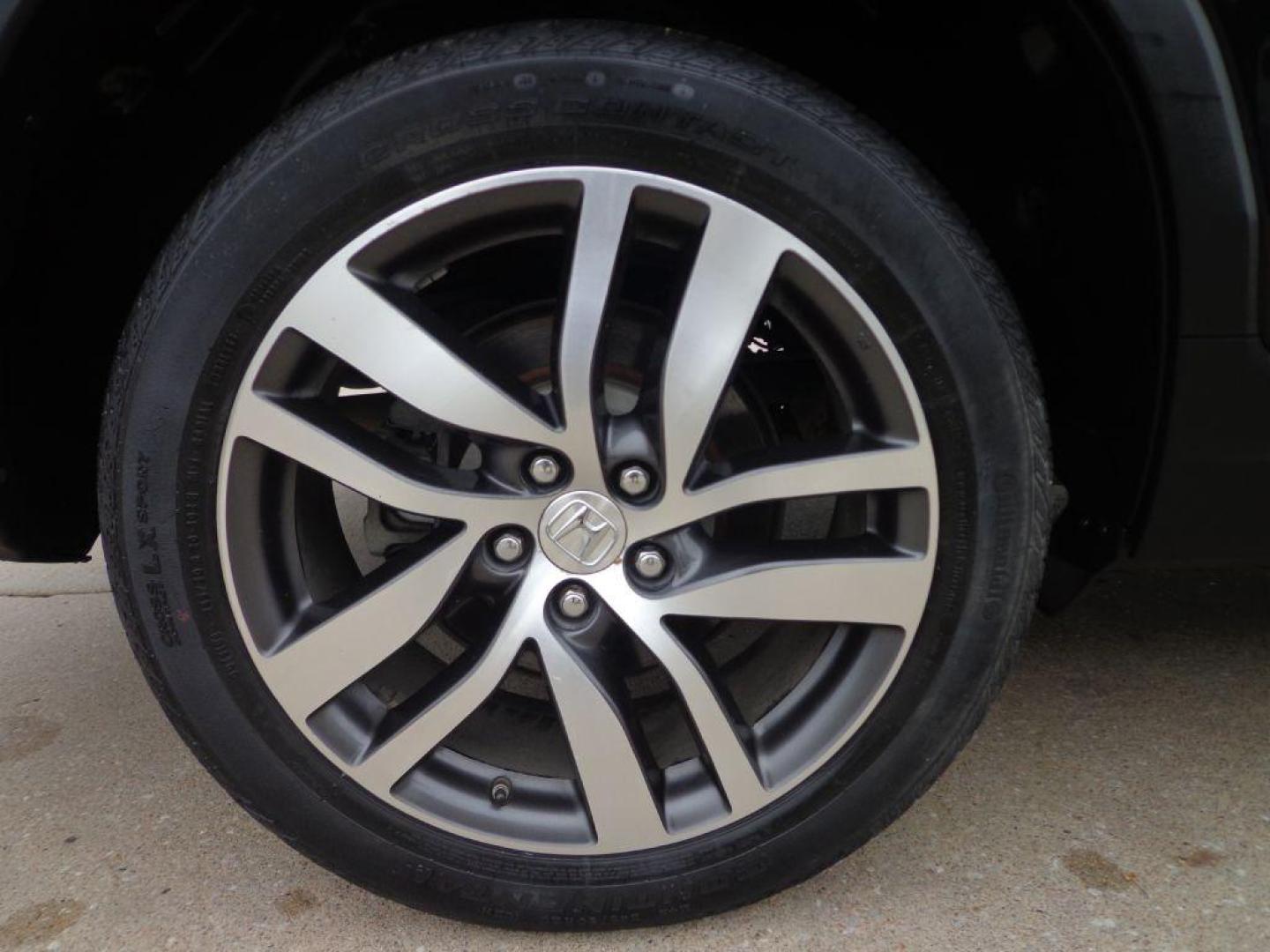 2016 BLACK HONDA PILOT ELITE (5FNYF6H03GB) with an 3.5L engine, Automatic transmission, located at 6610 L St., Omaha, NE, 68117, (402) 731-7800, 41.212872, -96.014702 - SHARP 2-OWNER, CLEAN CARFAX, ELITE MODEL LOADED WITH OPTONS AND NEWER TIRES! *****We have found that most customers do the majority of their shopping online before visiting a dealership. For this reason we feel it necessary to have a competitive price on our used vehicles right up front. We s - Photo#9