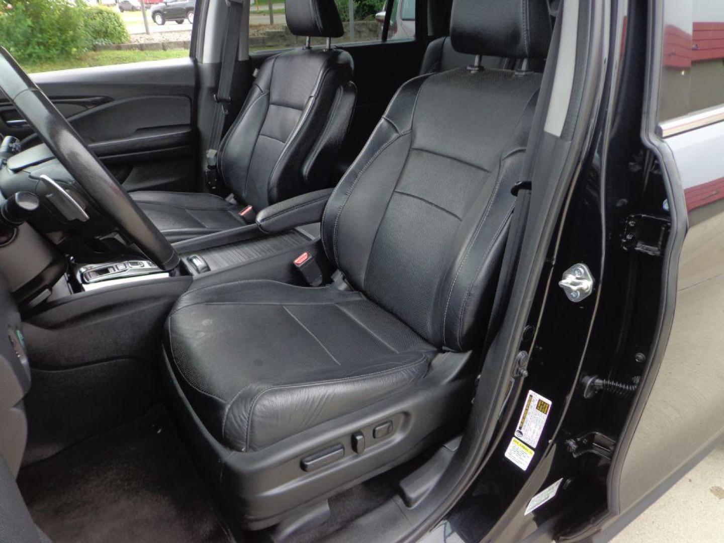 2016 BLACK HONDA PILOT ELITE (5FNYF6H03GB) with an 3.5L engine, Automatic transmission, located at 6610 L St., Omaha, NE, 68117, (402) 731-7800, 41.212872, -96.014702 - SHARP 2-OWNER, CLEAN CARFAX, ELITE MODEL LOADED WITH OPTONS AND NEWER TIRES! *****We have found that most customers do the majority of their shopping online before visiting a dealership. For this reason we feel it necessary to have a competitive price on our used vehicles right up front. We s - Photo#13