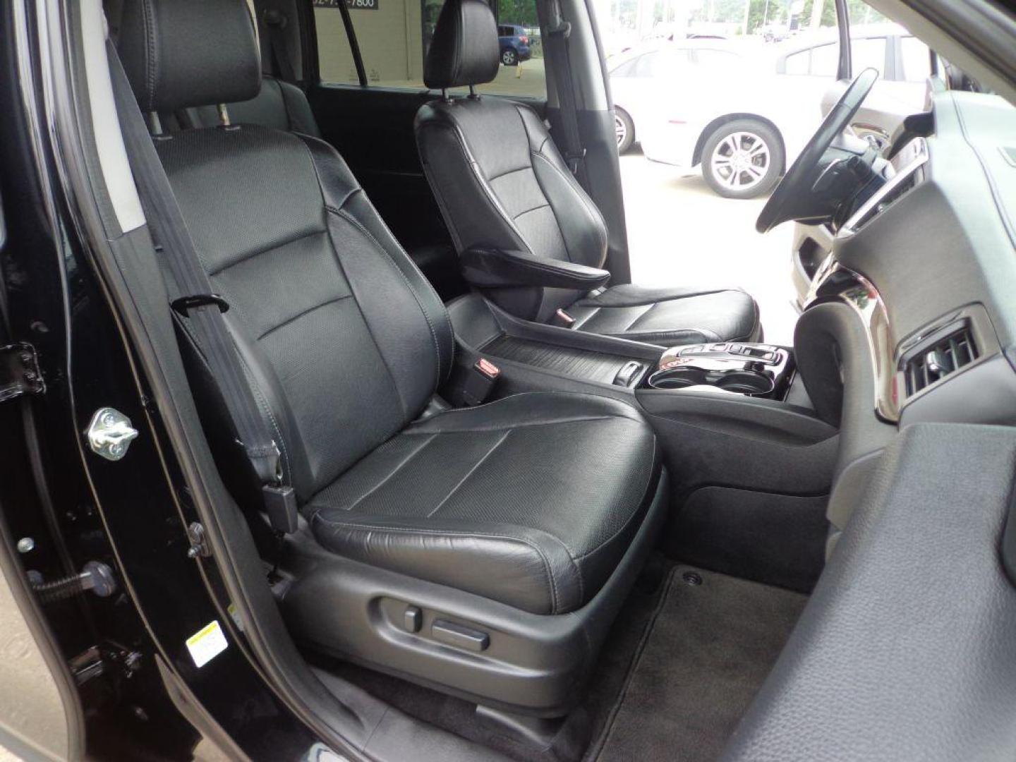 2016 BLACK HONDA PILOT ELITE (5FNYF6H03GB) with an 3.5L engine, Automatic transmission, located at 6610 L St., Omaha, NE, 68117, (402) 731-7800, 41.212872, -96.014702 - SHARP 2-OWNER, CLEAN CARFAX, ELITE MODEL LOADED WITH OPTONS AND NEWER TIRES! *****We have found that most customers do the majority of their shopping online before visiting a dealership. For this reason we feel it necessary to have a competitive price on our used vehicles right up front. We s - Photo#16