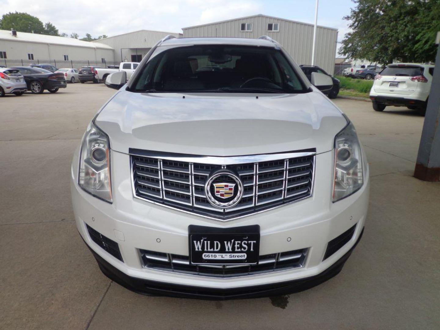 2015 WHITE CADILLAC SRX LUXURY COLLECTION (3GYFNEE38FS) with an 3.6L engine, Automatic transmission, located at 6610 L St., Omaha, NE, 68117, (402) 731-7800, 41.212872, -96.014702 - THIS VEHICLE HAS A CLEAN TITLE WITH A FREE CARFAX PROVIDED! 2-OWNER, CLEAN CARFAX, LOW MILEAGE, LOADED WITH OPTIONS AND NEWER TIRES! *****We have found that most customers do the majority of their shopping online before visiting a dealership. For this reason we feel it necessary to have a comp - Photo#1