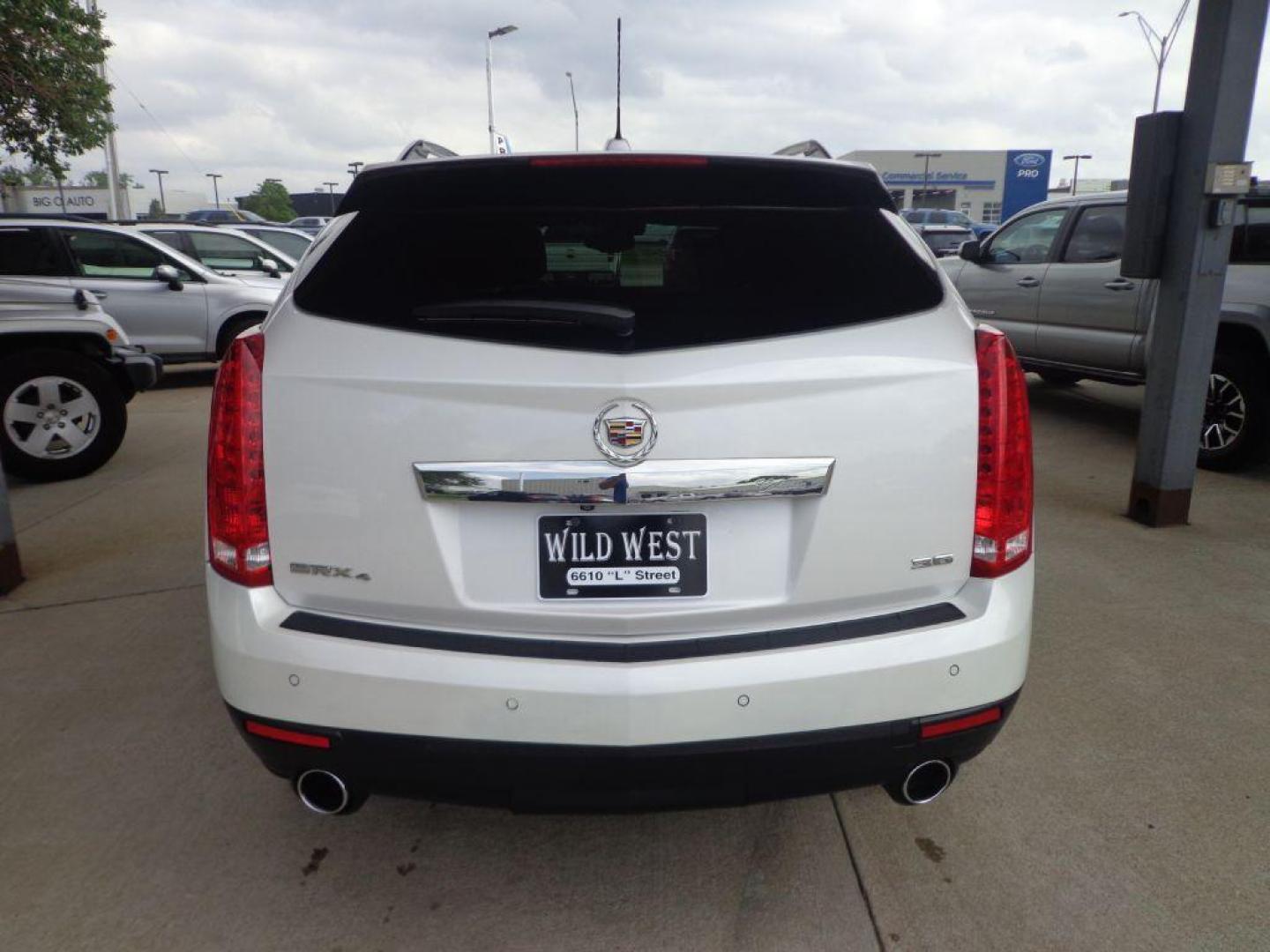 2015 WHITE CADILLAC SRX LUXURY COLLECTION (3GYFNEE38FS) with an 3.6L engine, Automatic transmission, located at 6610 L St., Omaha, NE, 68117, (402) 731-7800, 41.212872, -96.014702 - THIS VEHICLE HAS A CLEAN TITLE WITH A FREE CARFAX PROVIDED! 2-OWNER, CLEAN CARFAX, LOW MILEAGE, LOADED WITH OPTIONS AND NEWER TIRES! *****We have found that most customers do the majority of their shopping online before visiting a dealership. For this reason we feel it necessary to have a comp - Photo#4