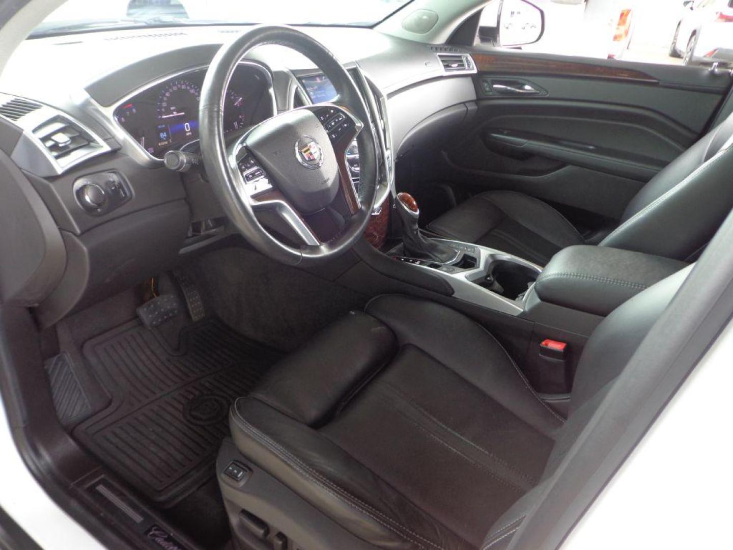 2015 WHITE CADILLAC SRX LUXURY COLLECTION (3GYFNEE38FS) with an 3.6L engine, Automatic transmission, located at 6610 L St., Omaha, NE, 68117, (402) 731-7800, 41.212872, -96.014702 - THIS VEHICLE HAS A CLEAN TITLE WITH A FREE CARFAX PROVIDED! 2-OWNER, CLEAN CARFAX, LOW MILEAGE, LOADED WITH OPTIONS AND NEWER TIRES! *****We have found that most customers do the majority of their shopping online before visiting a dealership. For this reason we feel it necessary to have a comp - Photo#13