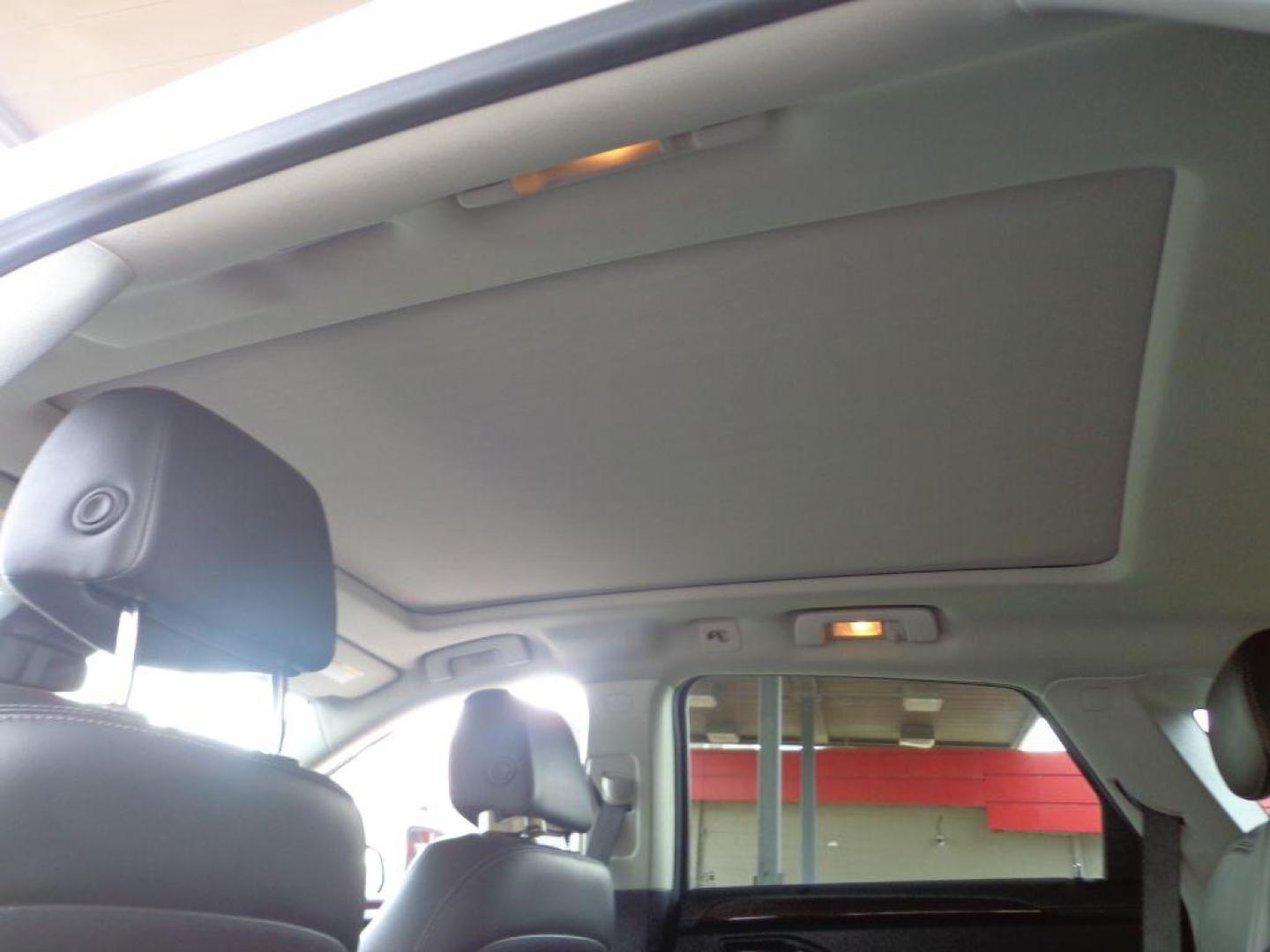 2015 WHITE CADILLAC SRX LUXURY COLLECTION (3GYFNEE38FS) with an 3.6L engine, Automatic transmission, located at 6610 L St., Omaha, NE, 68117, (402) 731-7800, 41.212872, -96.014702 - THIS VEHICLE HAS A CLEAN TITLE WITH A FREE CARFAX PROVIDED! 2-OWNER, CLEAN CARFAX, LOW MILEAGE, LOADED WITH OPTIONS AND NEWER TIRES! *****We have found that most customers do the majority of their shopping online before visiting a dealership. For this reason we feel it necessary to have a comp - Photo#20