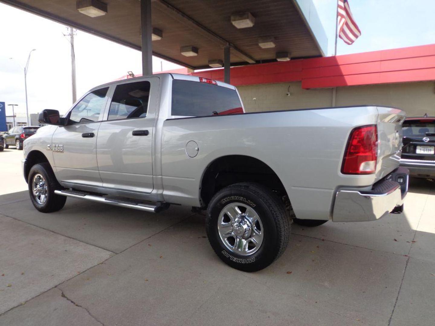 2018 SILVER RAM 2500 TRADESMAN (3C6UR5CL4JG) with an 6.7L engine, Automatic transmission, located at 6610 L St., Omaha, NE, 68117, (402) 731-7800, 41.212872, -96.014702 - THIS VEHICLE HAS A CLEAN TITLE WITH A FREE CARFAX PROVIDED! SHARP 1-OWNER, CLEAN CARFAX, LOW MILEAGE, RUST-FREE READY TO GO! *****We have found that most customers do the majority of their shopping online before visiting a dealership. For this reason we feel it necessary to have a competitive - Photo#5