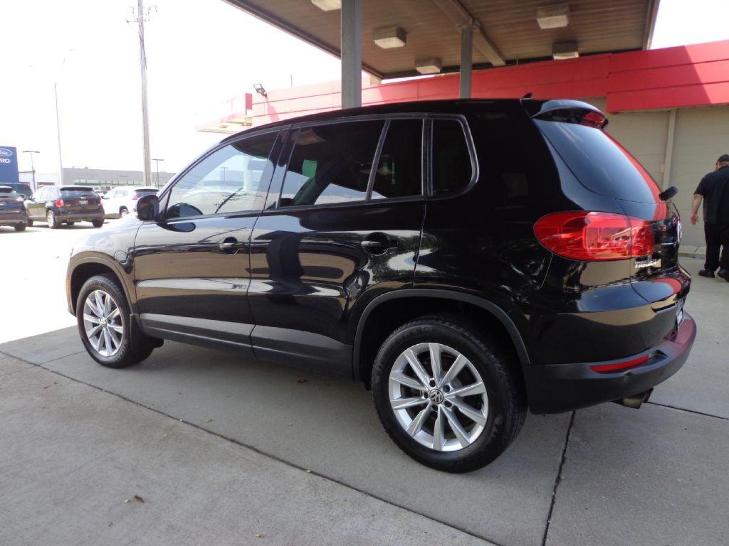 2014 BLACK VOLKSWAGEN TIGUAN S (WVGAV3AX0EW) with an 2.0L engine, Automatic transmission, located at 6610 L St., Omaha, NE, 68117, (402) 731-7800, 41.212872, -96.014702 - SHARP 2-OWNER, CLEAN CARFAX, HEATED LEATHER AND NEWER TIRES! *****We have found that most customers do the majority of their shopping online before visiting a dealership. For this reason we feel it necessary to have a competitive price on our used vehicles right up front. We spend time research - Photo#5