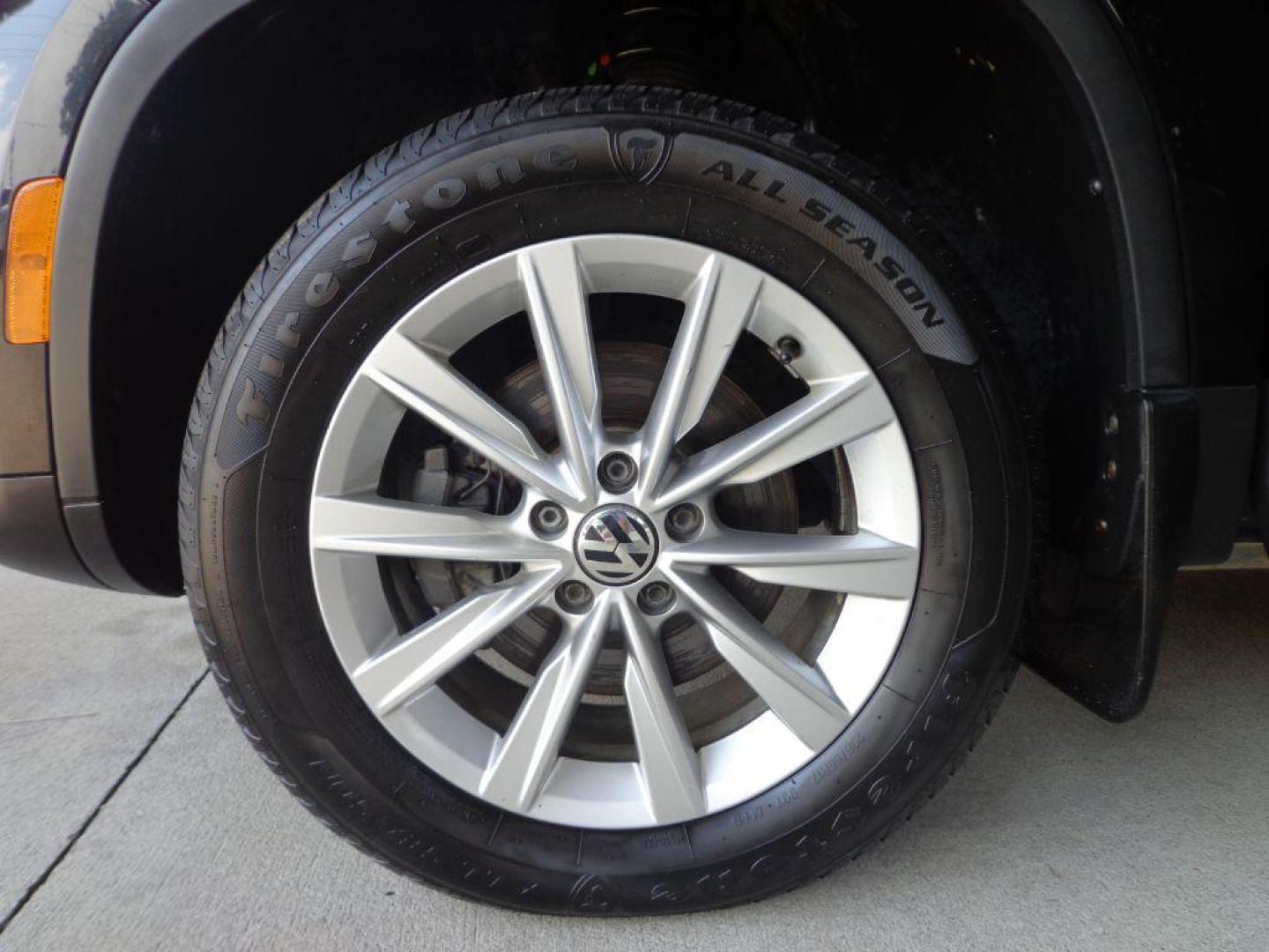 2014 BLACK VOLKSWAGEN TIGUAN S (WVGAV3AX0EW) with an 2.0L engine, Automatic transmission, located at 6610 L St., Omaha, NE, 68117, (402) 731-7800, 41.212872, -96.014702 - SHARP 2-OWNER, CLEAN CARFAX, HEATED LEATHER AND NEWER TIRES! *****We have found that most customers do the majority of their shopping online before visiting a dealership. For this reason we feel it necessary to have a competitive price on our used vehicles right up front. We spend time research - Photo#7