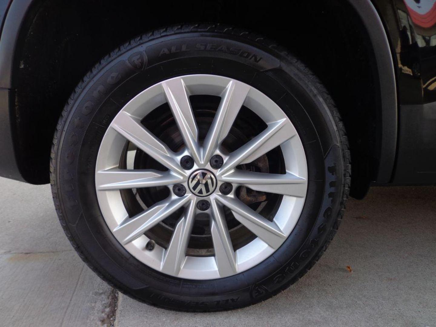 2014 BLACK VOLKSWAGEN TIGUAN S (WVGAV3AX0EW) with an 2.0L engine, Automatic transmission, located at 6610 L St., Omaha, NE, 68117, (402) 731-7800, 41.212872, -96.014702 - SHARP 2-OWNER, CLEAN CARFAX, HEATED LEATHER AND NEWER TIRES! *****We have found that most customers do the majority of their shopping online before visiting a dealership. For this reason we feel it necessary to have a competitive price on our used vehicles right up front. We spend time research - Photo#9