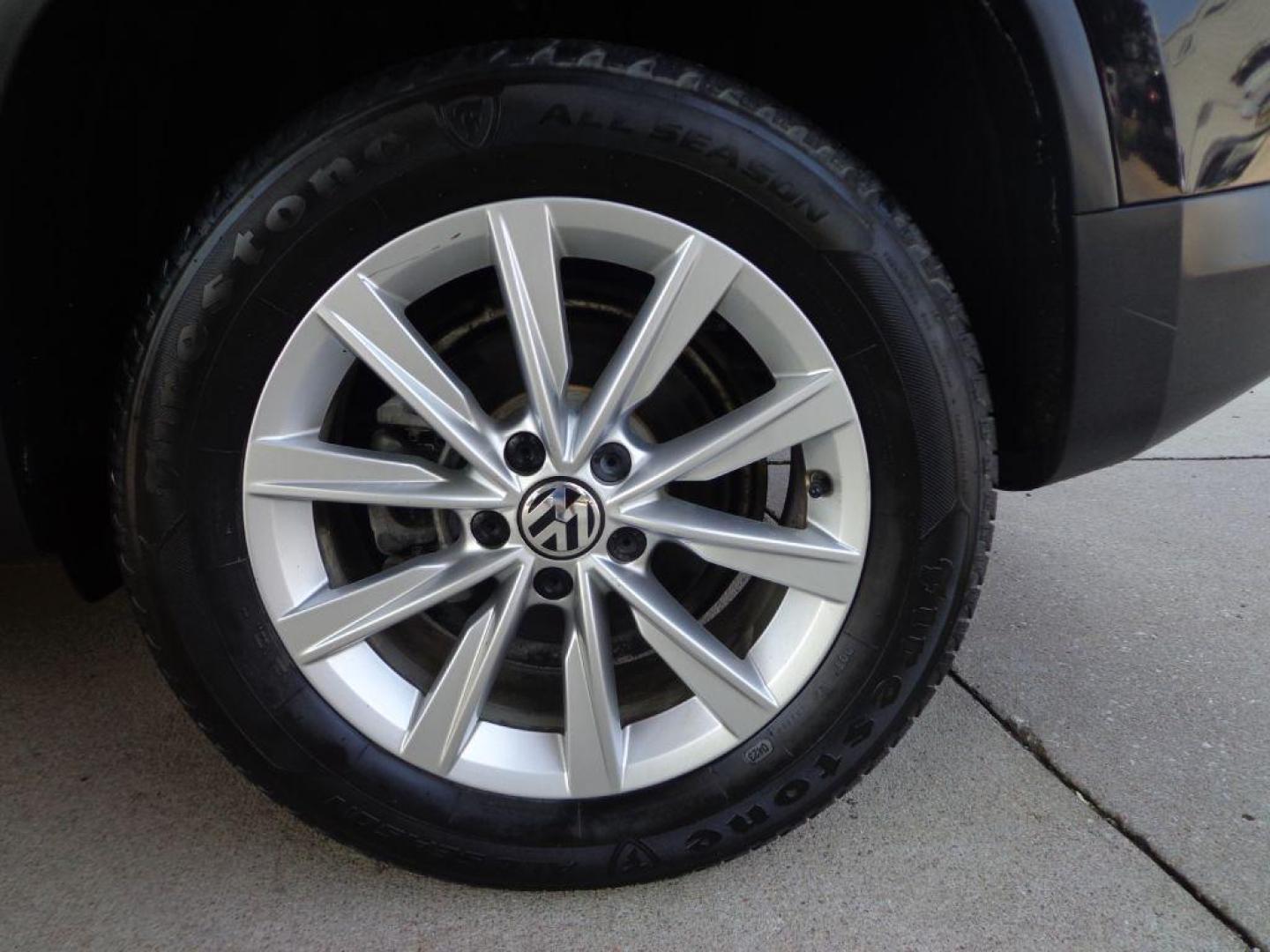 2014 BLACK VOLKSWAGEN TIGUAN S (WVGAV3AX0EW) with an 2.0L engine, Automatic transmission, located at 6610 L St., Omaha, NE, 68117, (402) 731-7800, 41.212872, -96.014702 - SHARP 2-OWNER, CLEAN CARFAX, HEATED LEATHER AND NEWER TIRES! *****We have found that most customers do the majority of their shopping online before visiting a dealership. For this reason we feel it necessary to have a competitive price on our used vehicles right up front. We spend time research - Photo#10