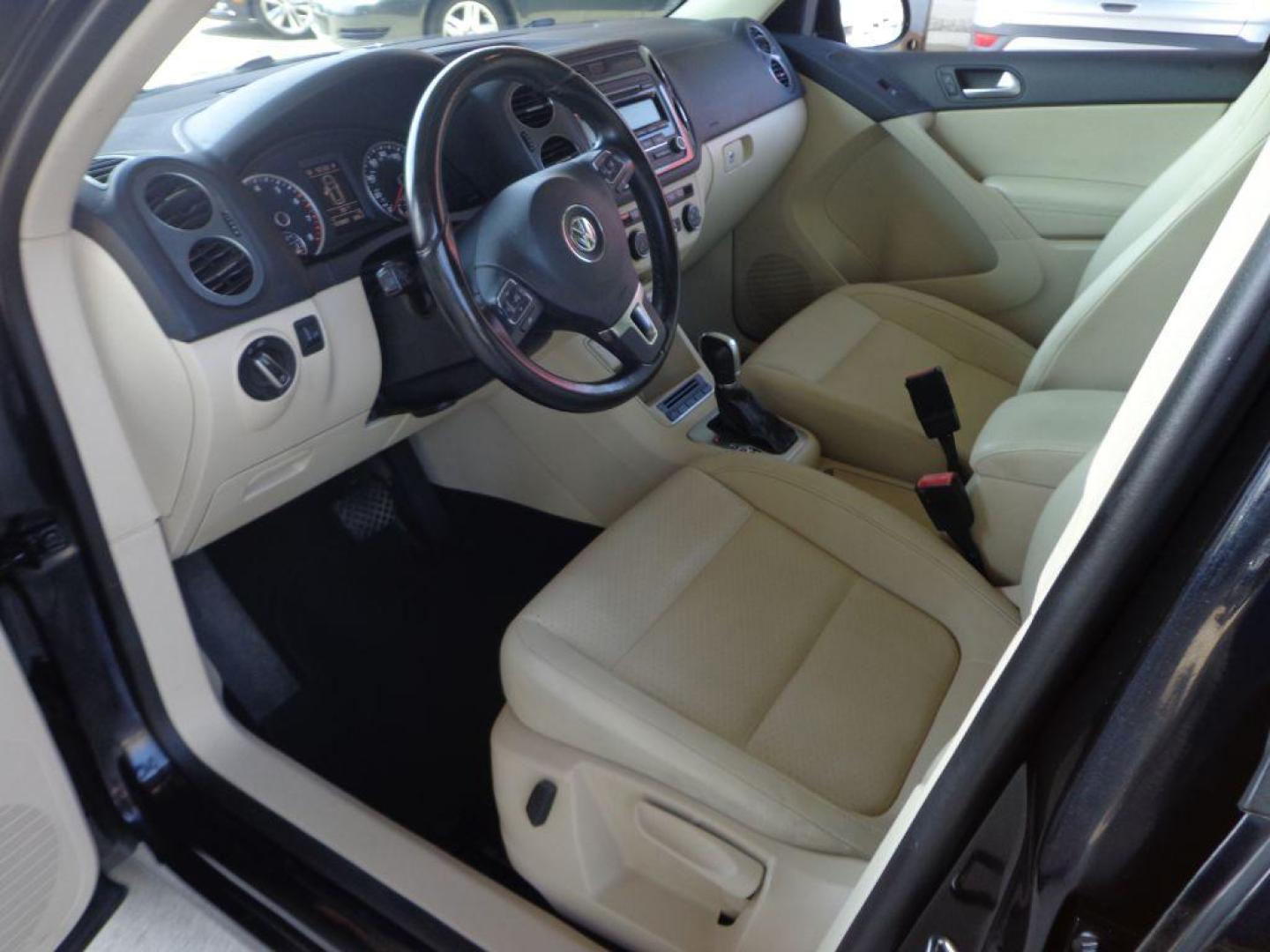 2014 BLACK VOLKSWAGEN TIGUAN S (WVGAV3AX0EW) with an 2.0L engine, Automatic transmission, located at 6610 L St., Omaha, NE, 68117, (402) 731-7800, 41.212872, -96.014702 - SHARP 2-OWNER, CLEAN CARFAX, HEATED LEATHER AND NEWER TIRES! *****We have found that most customers do the majority of their shopping online before visiting a dealership. For this reason we feel it necessary to have a competitive price on our used vehicles right up front. We spend time research - Photo#13