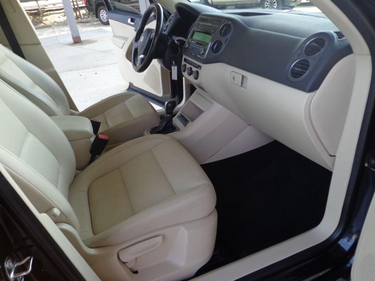 2014 BLACK VOLKSWAGEN TIGUAN S (WVGAV3AX0EW) with an 2.0L engine, Automatic transmission, located at 6610 L St., Omaha, NE, 68117, (402) 731-7800, 41.212872, -96.014702 - SHARP 2-OWNER, CLEAN CARFAX, HEATED LEATHER AND NEWER TIRES! *****We have found that most customers do the majority of their shopping online before visiting a dealership. For this reason we feel it necessary to have a competitive price on our used vehicles right up front. We spend time research - Photo#17