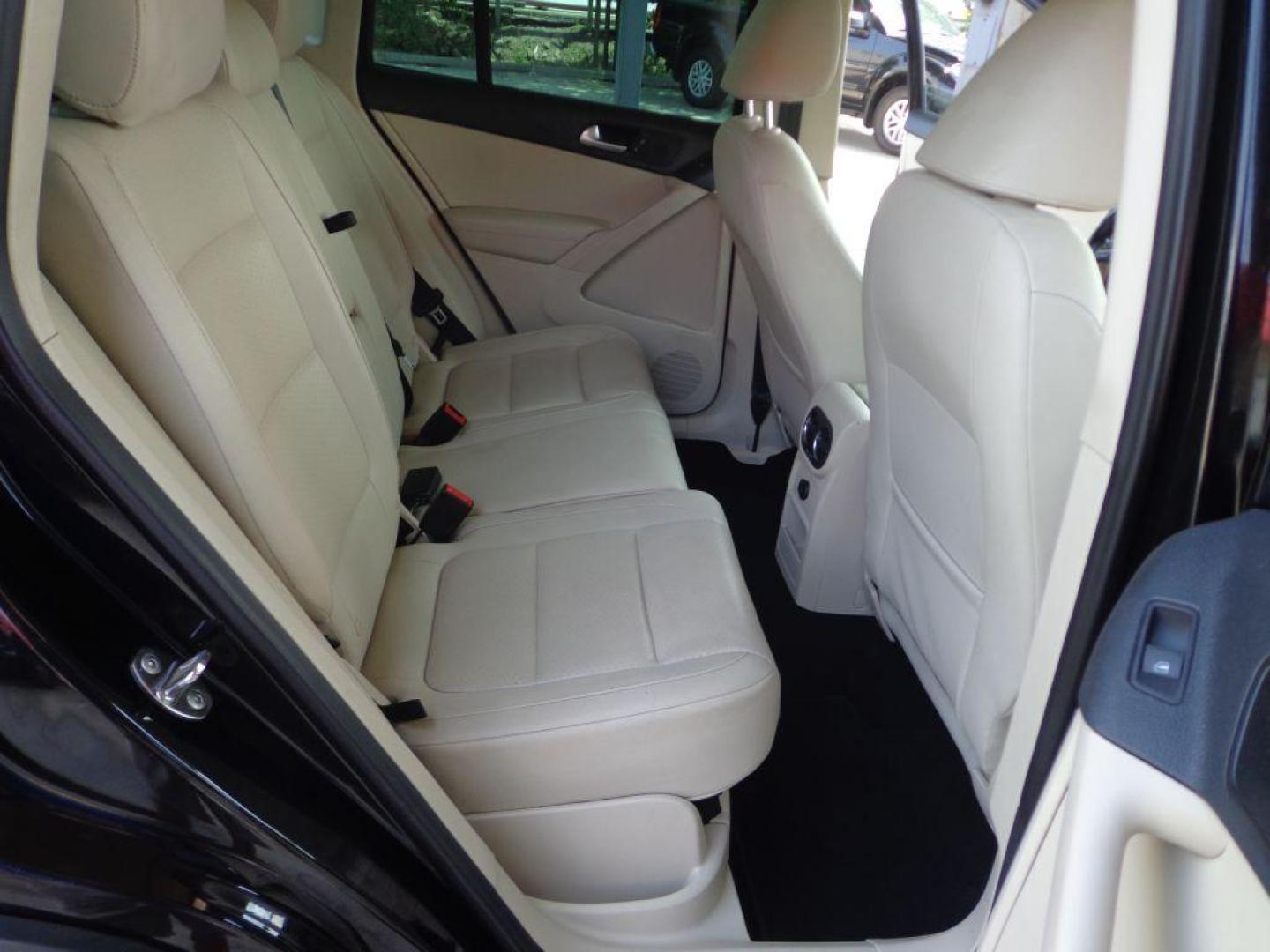 2014 BLACK VOLKSWAGEN TIGUAN S (WVGAV3AX0EW) with an 2.0L engine, Automatic transmission, located at 6610 L St., Omaha, NE, 68117, (402) 731-7800, 41.212872, -96.014702 - SHARP 2-OWNER, CLEAN CARFAX, HEATED LEATHER AND NEWER TIRES! *****We have found that most customers do the majority of their shopping online before visiting a dealership. For this reason we feel it necessary to have a competitive price on our used vehicles right up front. We spend time research - Photo#18