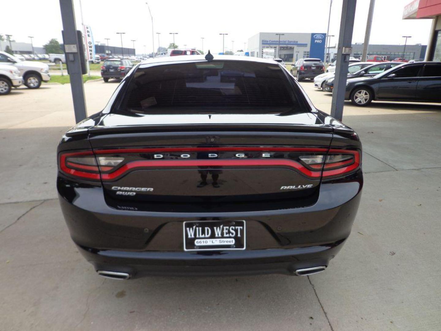 2015 BLACK DODGE CHARGER SXT (2C3CDXJG2FH) with an 3.6L engine, Automatic transmission, located at 6610 L St., Omaha, NE, 68117, (402) 731-7800, 41.212872, -96.014702 - THIS VEHICLE HAS A CLEAN TITLE WITH A FREE CARFAX PROVIDED! 2-OWNER, CLEAN CARFAX, LOW MILEAGE, AWD, RALLEYE, BEATS AUDIO, SUNROOF, NAV, BACKUP CAM, HEATED/COOLED FRONT, HEATED REAR SEATS, NEWER TIRES AND MUCH MORE *****We have found that most customers do the majority of their shopping online b - Photo#4