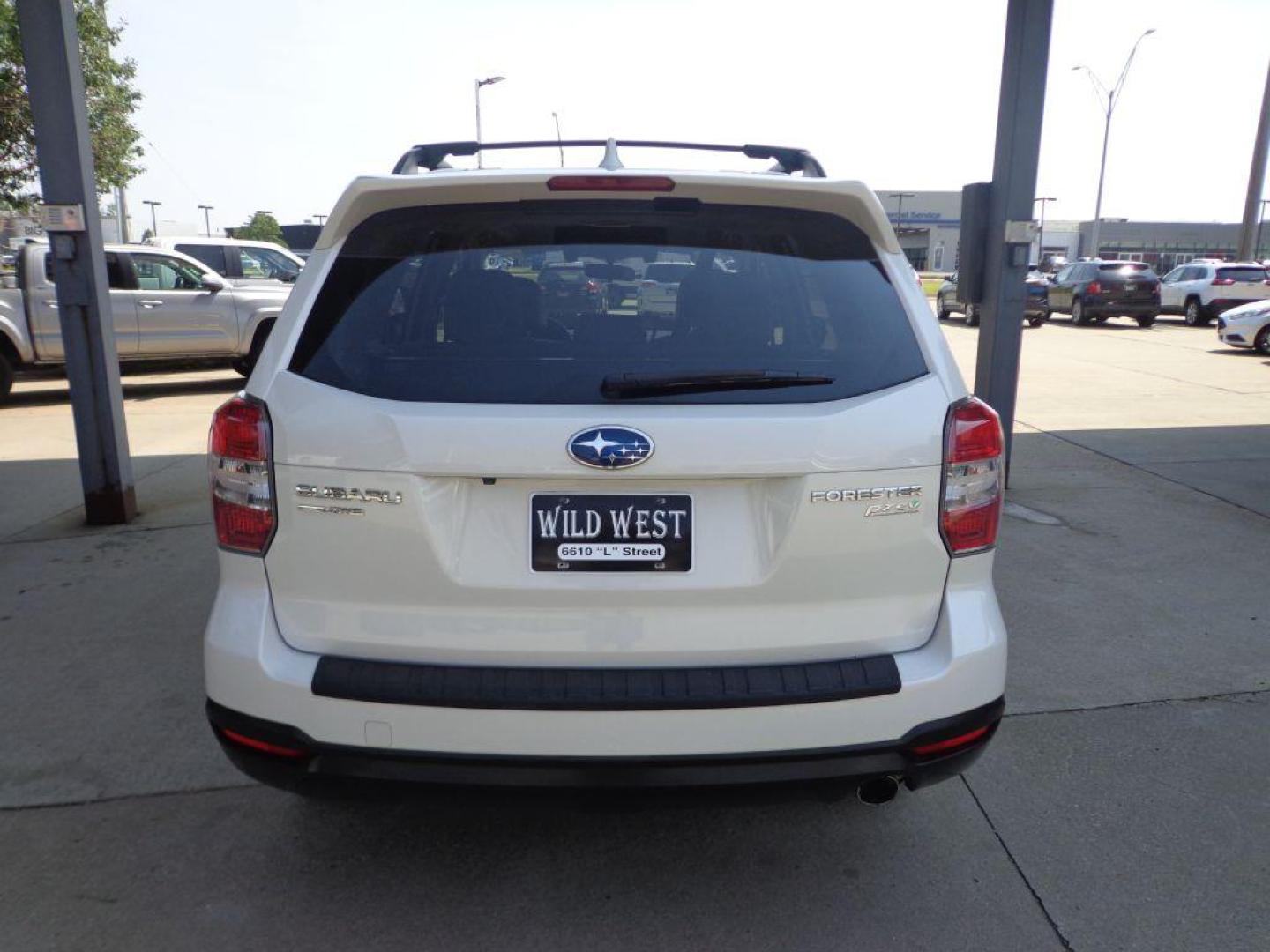 2016 WHITE SUBARU FORESTER 2.5I TOURING (JF2SJAXCXGH) with an 2.5L engine, Continuously Variable transmission, located at 6610 L St., Omaha, NE, 68117, (402) 731-7800, 41.212872, -96.014702 - Photo#4