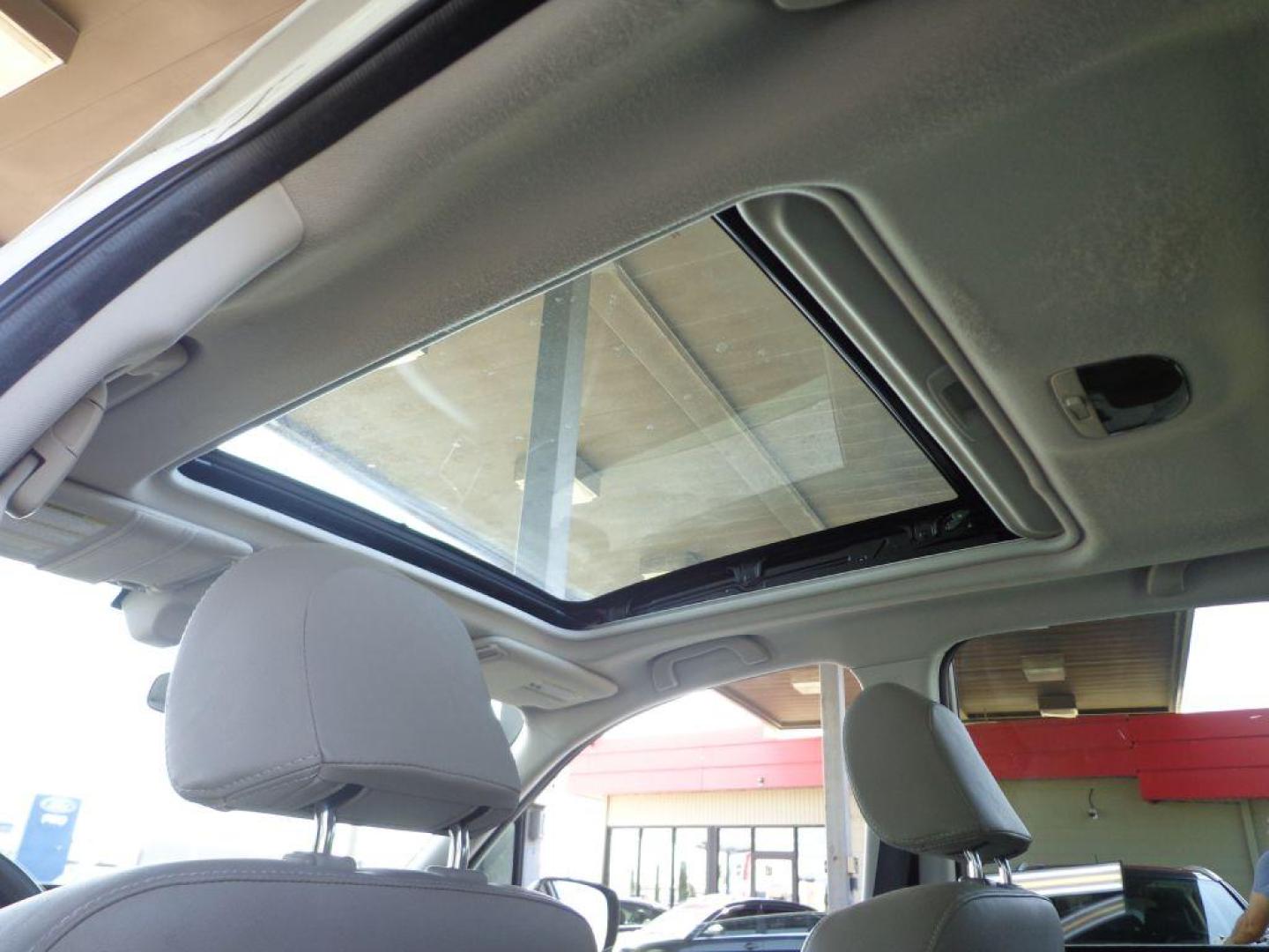 2016 WHITE SUBARU FORESTER 2.5I TOURING (JF2SJAXCXGH) with an 2.5L engine, Continuously Variable transmission, located at 6610 L St., Omaha, NE, 68117, (402) 731-7800, 41.212872, -96.014702 - Photo#20