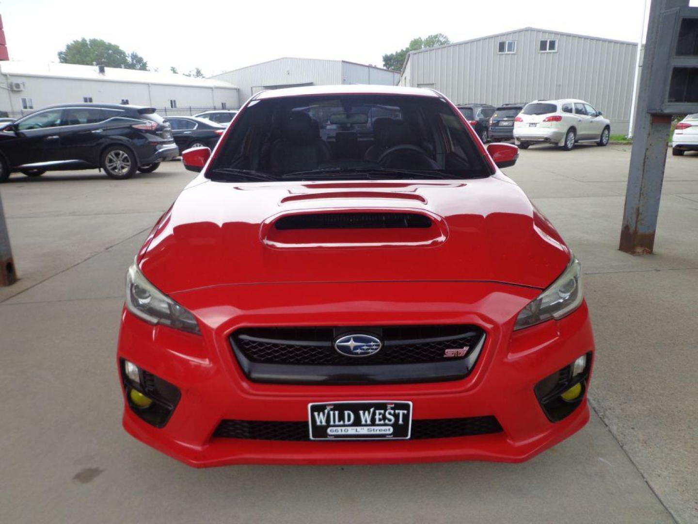 2017 RED SUBARU WRX STI LIMITED (JF1VA2Y60H9) with an 2.5L engine, 6-Speed Manual transmission, located at 6610 L St., Omaha, NE, 68117, (402) 731-7800, 41.212872, -96.014702 - THIS VEHICLE HAS A CLEAN TITLE WITH A FREE CARFAX PROVIDED! 2-OWNER, CLEAN CARFAX, LOW MILEAGE, SUNROOF, NAV, BACKUP CAM, BLIND SPOT AND NEWER TIRES! *****We have found that most customers do the majority of their shopping online before visiting a dealership. For this reason we feel it necessa - Photo#1