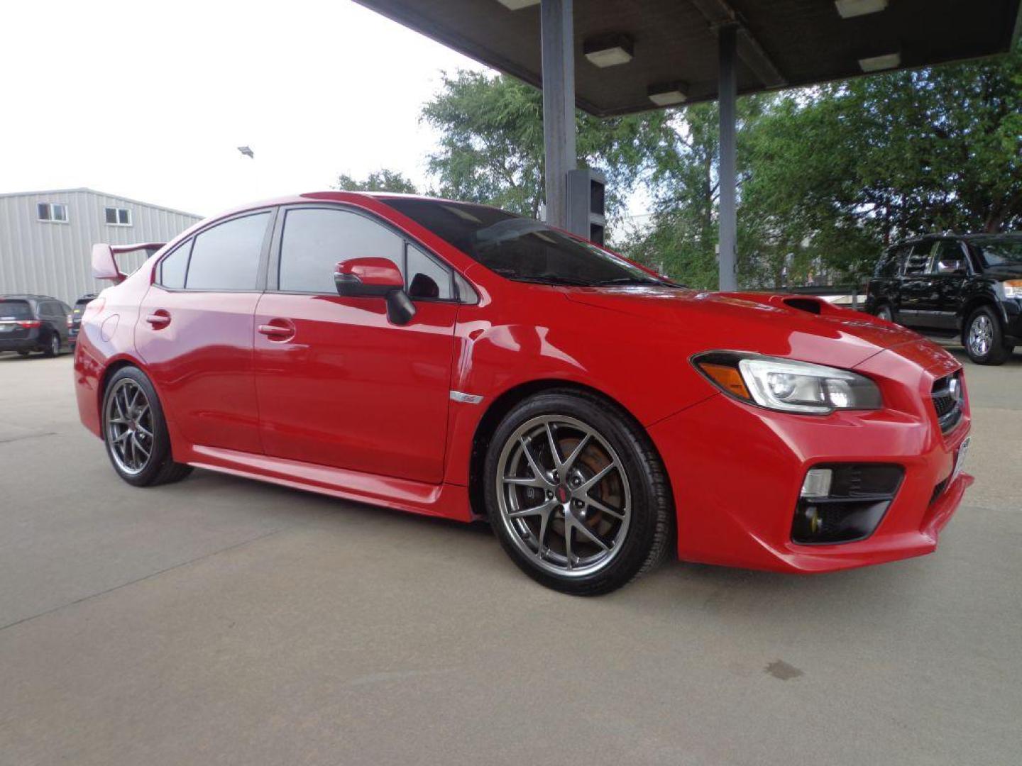 2017 RED SUBARU WRX STI LIMITED (JF1VA2Y60H9) with an 2.5L engine, 6-Speed Manual transmission, located at 6610 L St., Omaha, NE, 68117, (402) 731-7800, 41.212872, -96.014702 - THIS VEHICLE HAS A CLEAN TITLE WITH A FREE CARFAX PROVIDED! 2-OWNER, CLEAN CARFAX, LOW MILEAGE, SUNROOF, NAV, BACKUP CAM, BLIND SPOT AND NEWER TIRES! *****We have found that most customers do the majority of their shopping online before visiting a dealership. For this reason we feel it necessa - Photo#2