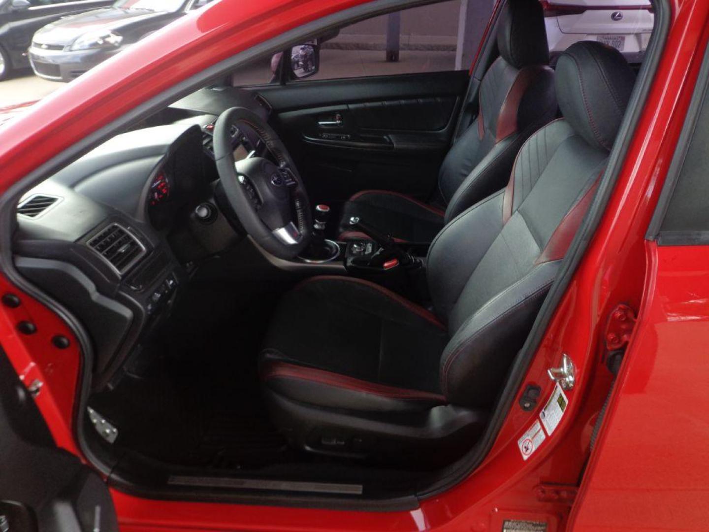 2017 RED SUBARU WRX STI LIMITED (JF1VA2Y60H9) with an 2.5L engine, 6-Speed Manual transmission, located at 6610 L St., Omaha, NE, 68117, (402) 731-7800, 41.212872, -96.014702 - THIS VEHICLE HAS A CLEAN TITLE WITH A FREE CARFAX PROVIDED! 2-OWNER, CLEAN CARFAX, LOW MILEAGE, SUNROOF, NAV, BACKUP CAM, BLIND SPOT AND NEWER TIRES! *****We have found that most customers do the majority of their shopping online before visiting a dealership. For this reason we feel it necessa - Photo#12