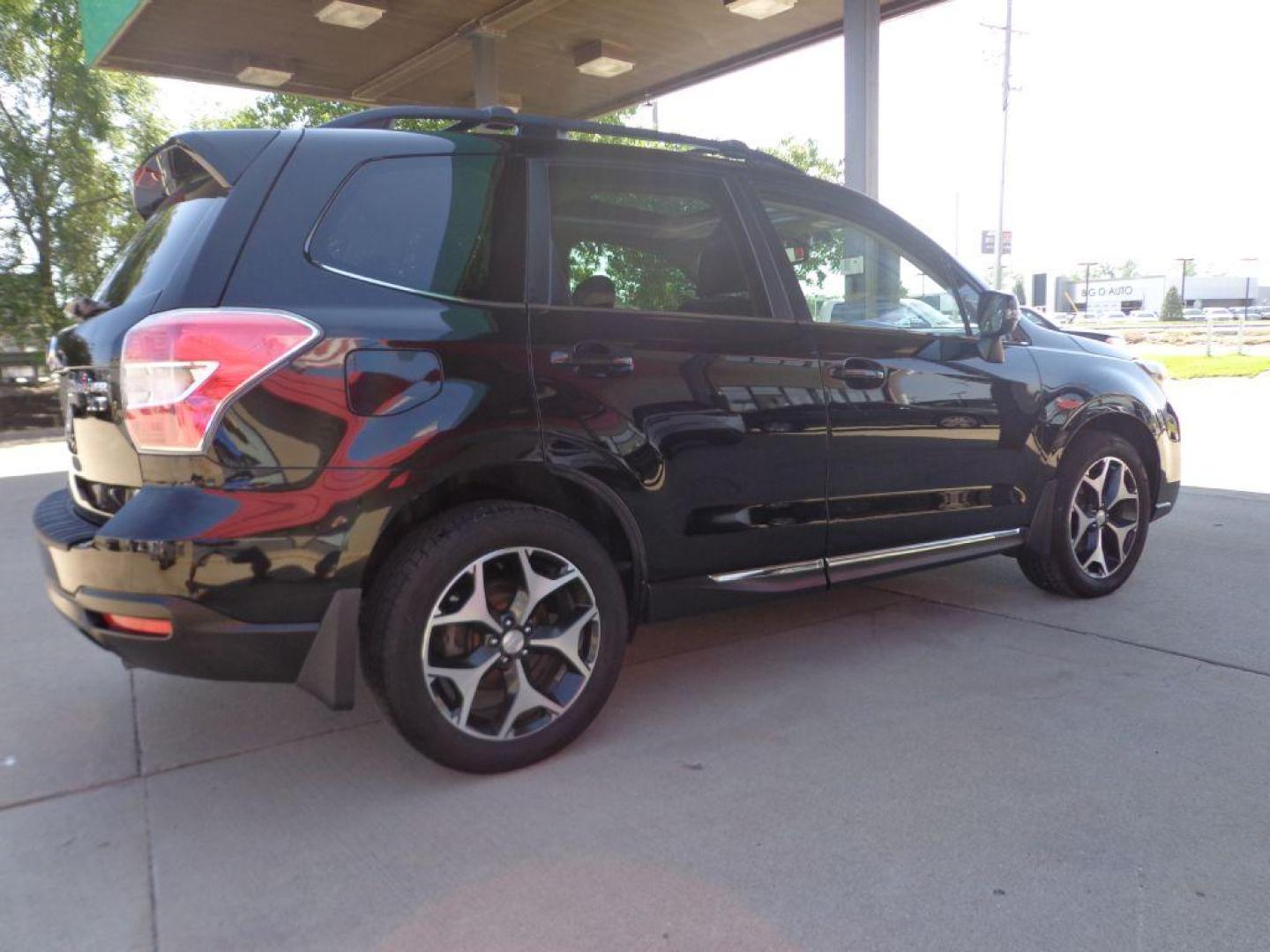 2015 BLACK SUBARU FORESTER 2.0XT TOURING (JF2SJGUC7FH) with an 2.0L engine, Continuously Variable transmission, located at 6610 L St., Omaha, NE, 68117, (402) 731-7800, 41.212872, -96.014702 - THIS VEHICLE HAS A CLEAN TITLE WITH A FREE CARFAX PROVIDED! 1-OWNER, CLEAN CARFAX, LOW MILEAGE. PANO ROOF, HARMON KARDON AUDIO, BACKUP CAM AND NEWER TIRES! *****We have found that most customers do the majority of their shopping online before visiting a dealership. For this reason we feel it - Photo#3