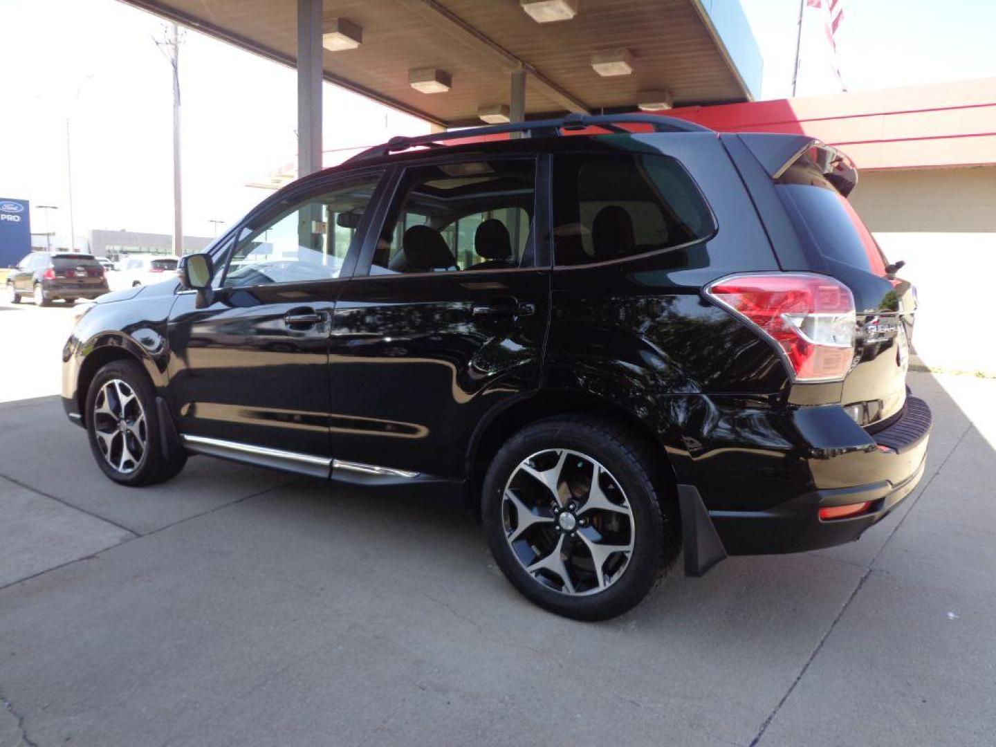 2015 BLACK SUBARU FORESTER 2.0XT TOURING (JF2SJGUC7FH) with an 2.0L engine, Continuously Variable transmission, located at 6610 L St., Omaha, NE, 68117, (402) 731-7800, 41.212872, -96.014702 - THIS VEHICLE HAS A CLEAN TITLE WITH A FREE CARFAX PROVIDED! 1-OWNER, CLEAN CARFAX, LOW MILEAGE. PANO ROOF, HARMON KARDON AUDIO, BACKUP CAM AND NEWER TIRES! *****We have found that most customers do the majority of their shopping online before visiting a dealership. For this reason we feel it - Photo#5