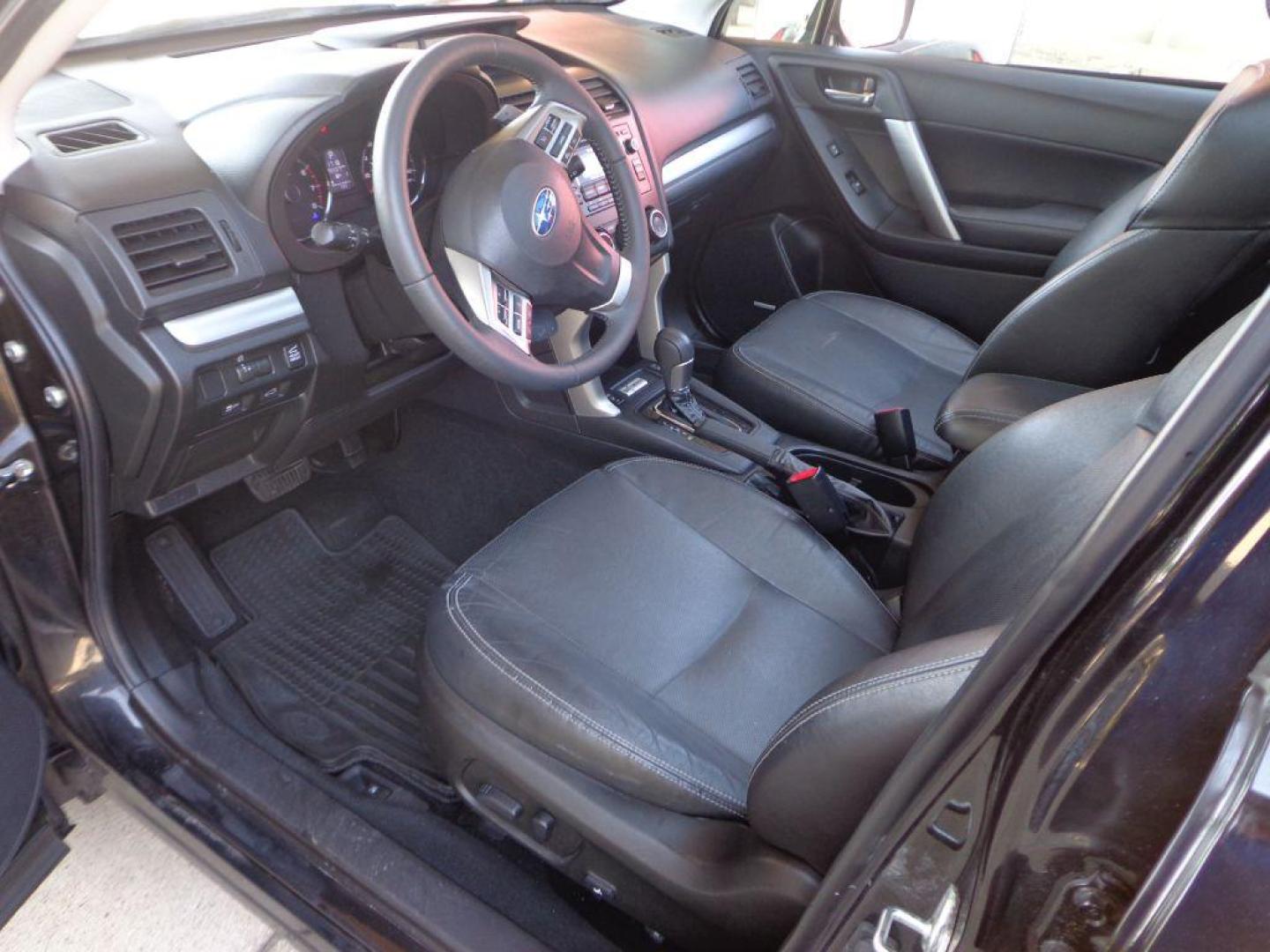 2015 BLACK SUBARU FORESTER 2.0XT TOURING (JF2SJGUC7FH) with an 2.0L engine, Continuously Variable transmission, located at 6610 L St., Omaha, NE, 68117, (402) 731-7800, 41.212872, -96.014702 - THIS VEHICLE HAS A CLEAN TITLE WITH A FREE CARFAX PROVIDED! 1-OWNER, CLEAN CARFAX, LOW MILEAGE. PANO ROOF, HARMON KARDON AUDIO, BACKUP CAM AND NEWER TIRES! *****We have found that most customers do the majority of their shopping online before visiting a dealership. For this reason we feel it - Photo#14