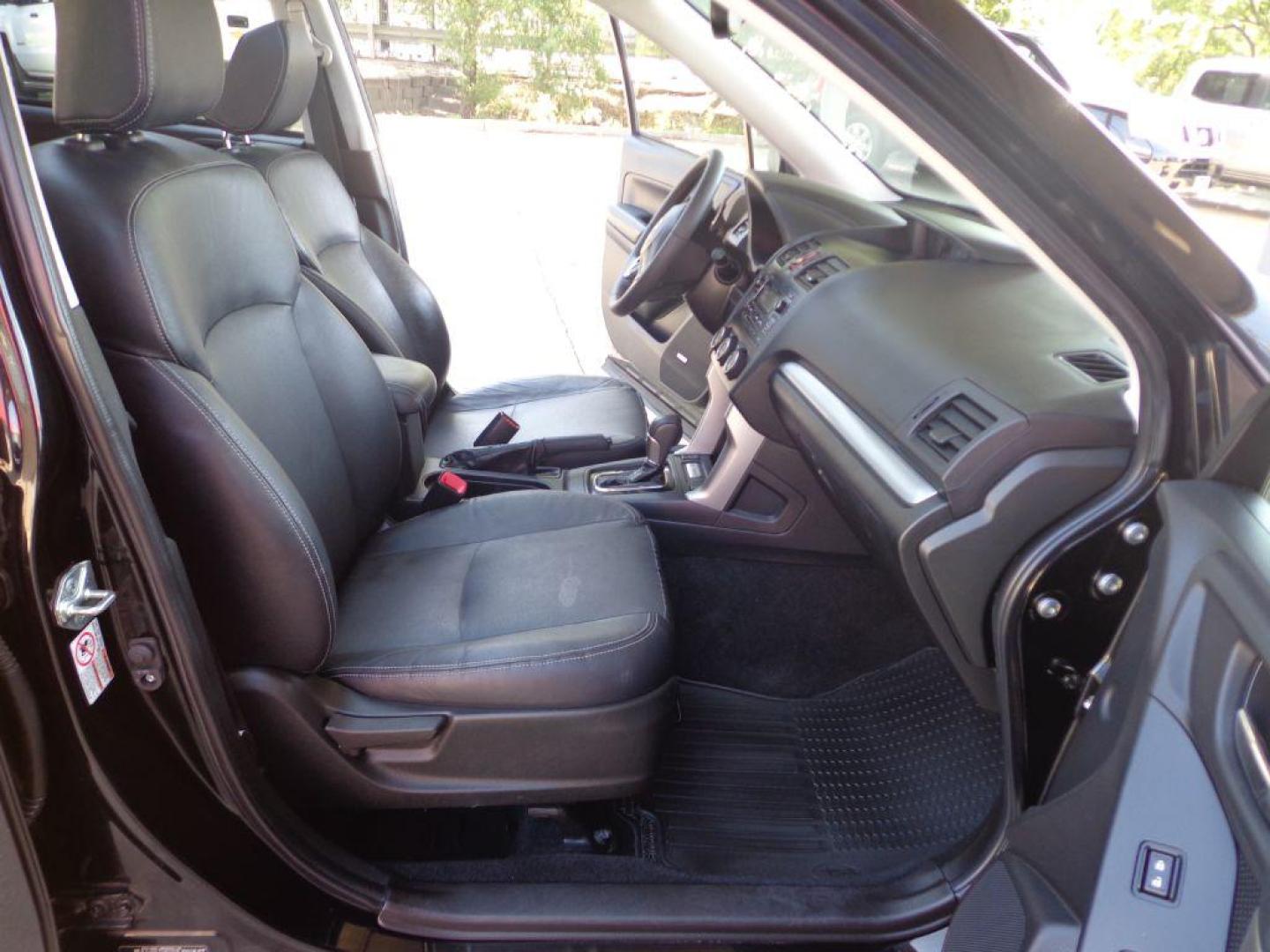 2015 BLACK SUBARU FORESTER 2.0XT TOURING (JF2SJGUC7FH) with an 2.0L engine, Continuously Variable transmission, located at 6610 L St., Omaha, NE, 68117, (402) 731-7800, 41.212872, -96.014702 - THIS VEHICLE HAS A CLEAN TITLE WITH A FREE CARFAX PROVIDED! 1-OWNER, CLEAN CARFAX, LOW MILEAGE. PANO ROOF, HARMON KARDON AUDIO, BACKUP CAM AND NEWER TIRES! *****We have found that most customers do the majority of their shopping online before visiting a dealership. For this reason we feel it - Photo#15