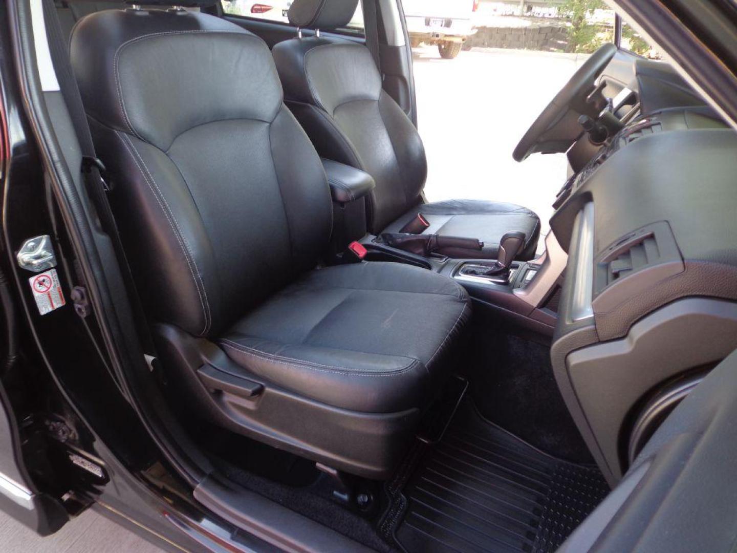 2015 BLACK SUBARU FORESTER 2.0XT TOURING (JF2SJGUC7FH) with an 2.0L engine, Continuously Variable transmission, located at 6610 L St., Omaha, NE, 68117, (402) 731-7800, 41.212872, -96.014702 - THIS VEHICLE HAS A CLEAN TITLE WITH A FREE CARFAX PROVIDED! 1-OWNER, CLEAN CARFAX, LOW MILEAGE. PANO ROOF, HARMON KARDON AUDIO, BACKUP CAM AND NEWER TIRES! *****We have found that most customers do the majority of their shopping online before visiting a dealership. For this reason we feel it - Photo#16