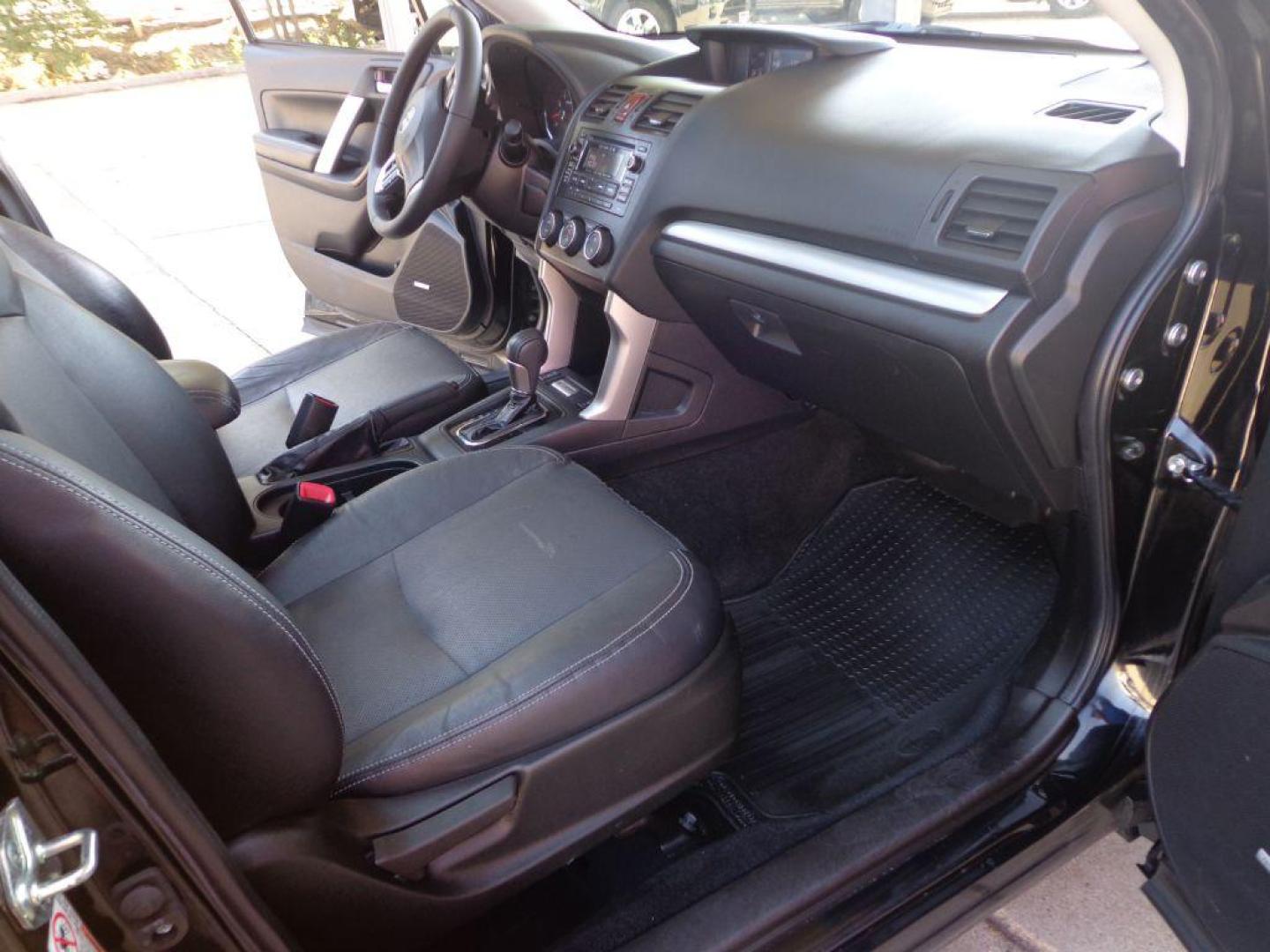 2015 BLACK SUBARU FORESTER 2.0XT TOURING (JF2SJGUC7FH) with an 2.0L engine, Continuously Variable transmission, located at 6610 L St., Omaha, NE, 68117, (402) 731-7800, 41.212872, -96.014702 - THIS VEHICLE HAS A CLEAN TITLE WITH A FREE CARFAX PROVIDED! 1-OWNER, CLEAN CARFAX, LOW MILEAGE. PANO ROOF, HARMON KARDON AUDIO, BACKUP CAM AND NEWER TIRES! *****We have found that most customers do the majority of their shopping online before visiting a dealership. For this reason we feel it - Photo#17
