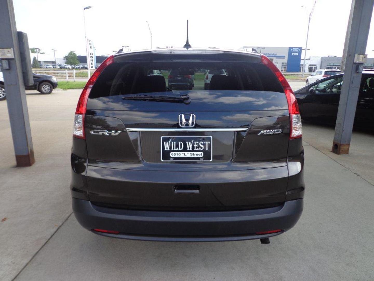 2013 BLACK HONDA CR-V EXL (5J6RM4H74DL) with an 2.4L engine, Automatic transmission, located at 6610 L St., Omaha, NE, 68117, (402) 731-7800, 41.212872, -96.014702 - THIS VEHICLE HAS A CLEAN TITLE WITH A FREE CARFAX PROVIDED! 2-OWNER, CLEAN CARFRAX, LOW MILEAGE WITH NEWER TIRES! *****We have found that most customers do the majority of their shopping online before visiting a dealership. For this reason we feel it necessary to have a competitive price on ou - Photo#4