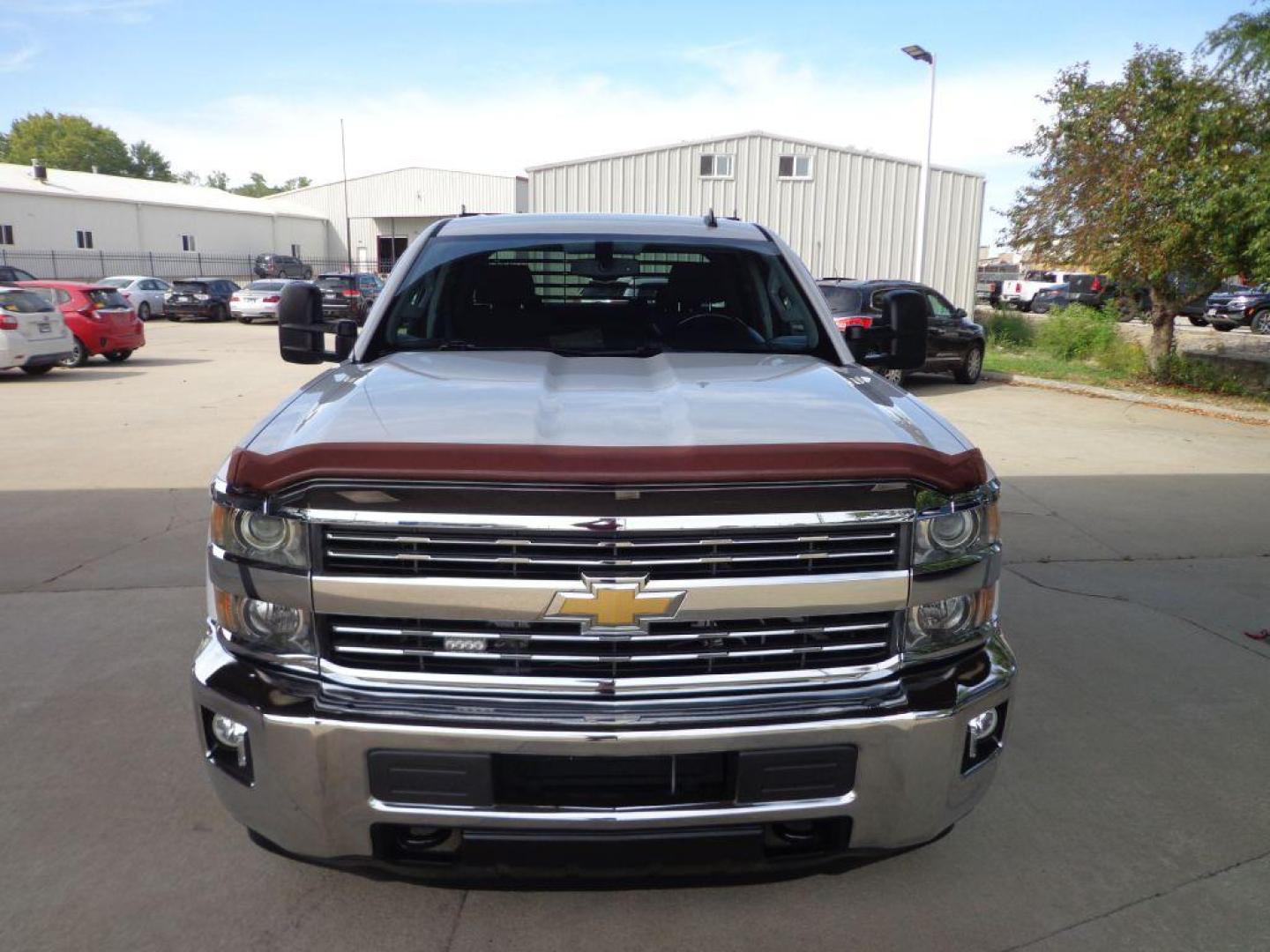 2015 WHITE CHEVROLET SILVERADO 2500 HEAVY DUTY LT (1GC1KVEGXFF) with an 6.0L engine, Automatic transmission, located at 6610 L St., Omaha, NE, 68117, (402) 731-7800, 41.212872, -96.014702 - THIS VEHICLE HAS A CLEAN TITLE WITH A FREE CARFAX PROVIDED! 1-OWNER, CLEAN CARFAX, LOW MILEAGE WITH NEW TIRES! *****We have found that most customers do the majority of their shopping online before visiting a dealership. For this reason we feel it necessary to have a competitive price on our use - Photo#1