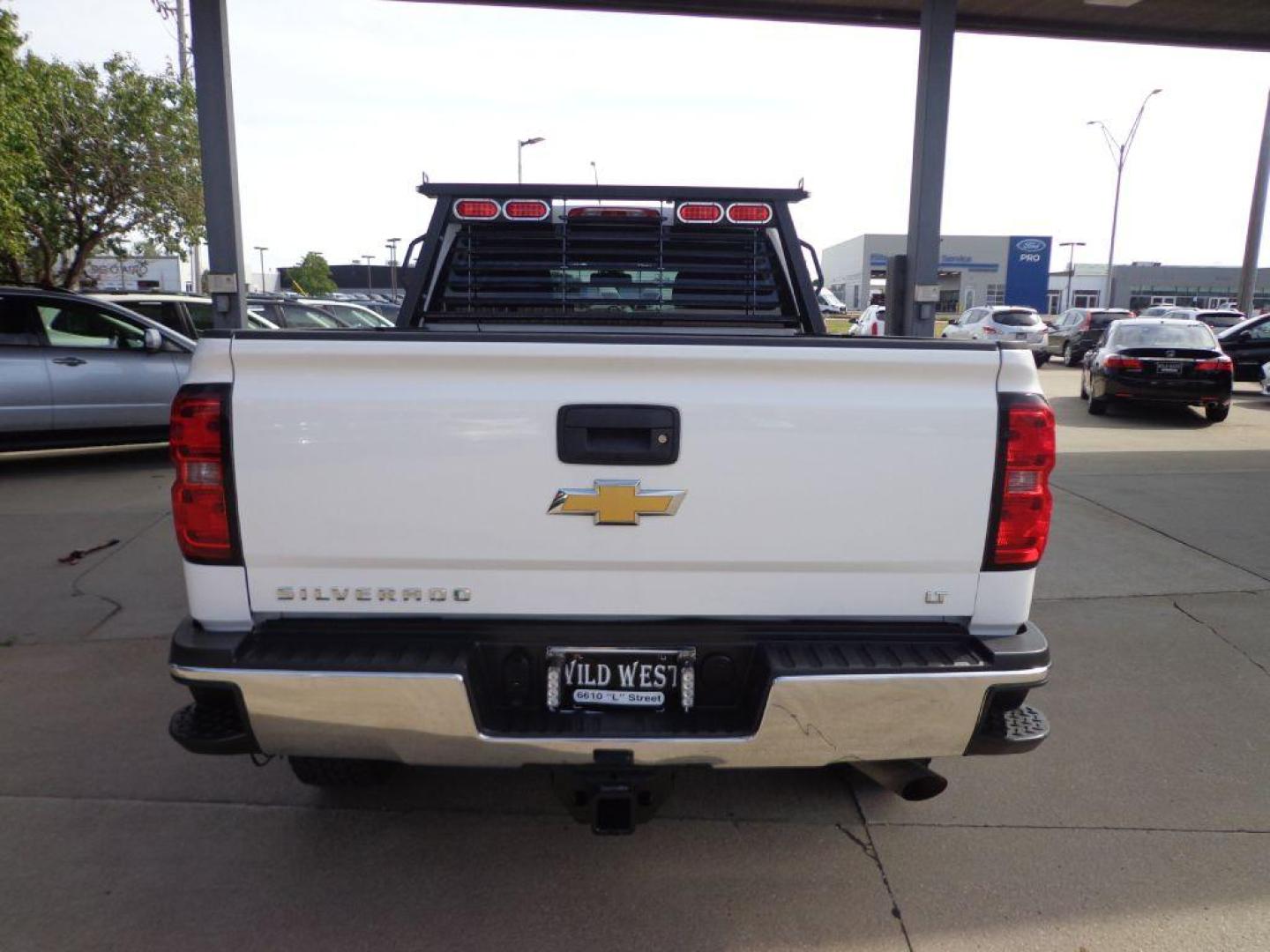 2015 WHITE CHEVROLET SILVERADO 2500 HEAVY DUTY LT (1GC1KVEGXFF) with an 6.0L engine, Automatic transmission, located at 6610 L St., Omaha, NE, 68117, (402) 731-7800, 41.212872, -96.014702 - THIS VEHICLE HAS A CLEAN TITLE WITH A FREE CARFAX PROVIDED! 1-OWNER, CLEAN CARFAX, LOW MILEAGE WITH NEW TIRES! *****We have found that most customers do the majority of their shopping online before visiting a dealership. For this reason we feel it necessary to have a competitive price on our use - Photo#4