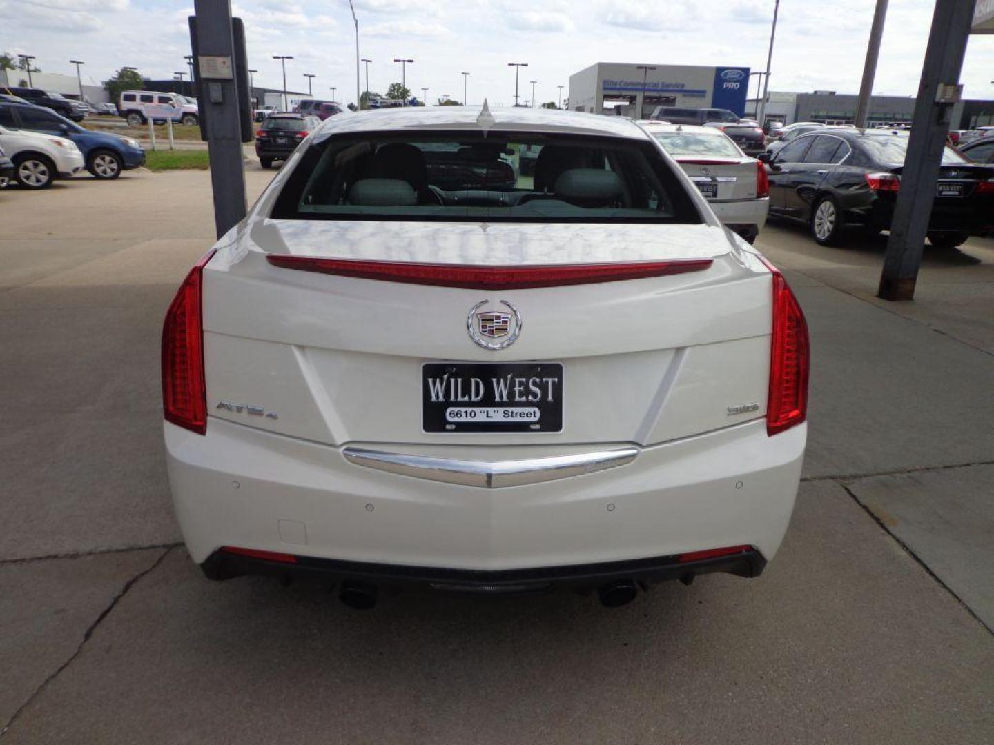 2013 WHITE CADILLAC ATS PREMIUM (1G6AL5S32D0) with an 3.6L engine, Automatic transmission, located at 6610 L St., Omaha, NE, 68117, (402) 731-7800, 41.212872, -96.014702 - THIS VEHICLE HAS A CLEAN TITLE WITH A FREE CARFAX PROVIDED! SHARP PREMIUM MODEL WITH A CLEAN CARFAX, LOW MILEAGE, NAV, SUNROOF, NEWER TIRES AND MUCH MORE! *****We have found that most customers do the majority of their shopping online before visiting a dealership. For this reason we feel it ne - Photo#4