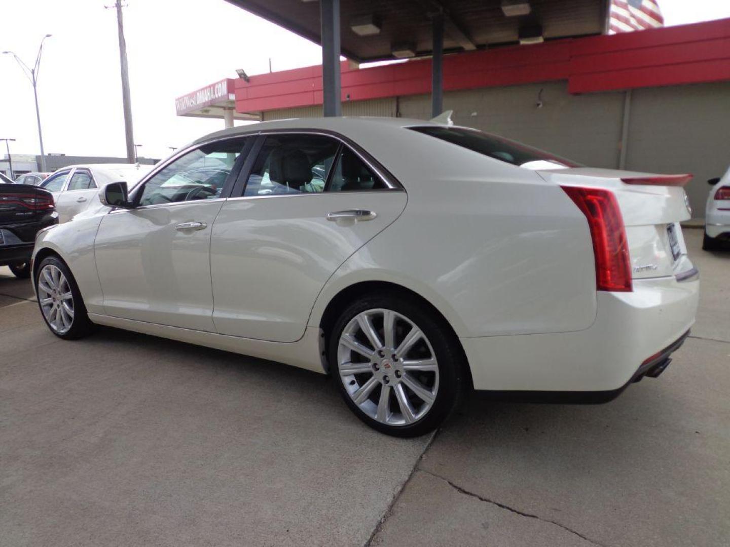 2013 WHITE CADILLAC ATS PREMIUM (1G6AL5S32D0) with an 3.6L engine, Automatic transmission, located at 6610 L St., Omaha, NE, 68117, (402) 731-7800, 41.212872, -96.014702 - THIS VEHICLE HAS A CLEAN TITLE WITH A FREE CARFAX PROVIDED! SHARP PREMIUM MODEL WITH A CLEAN CARFAX, LOW MILEAGE, NAV, SUNROOF, NEWER TIRES AND MUCH MORE! *****We have found that most customers do the majority of their shopping online before visiting a dealership. For this reason we feel it ne - Photo#5