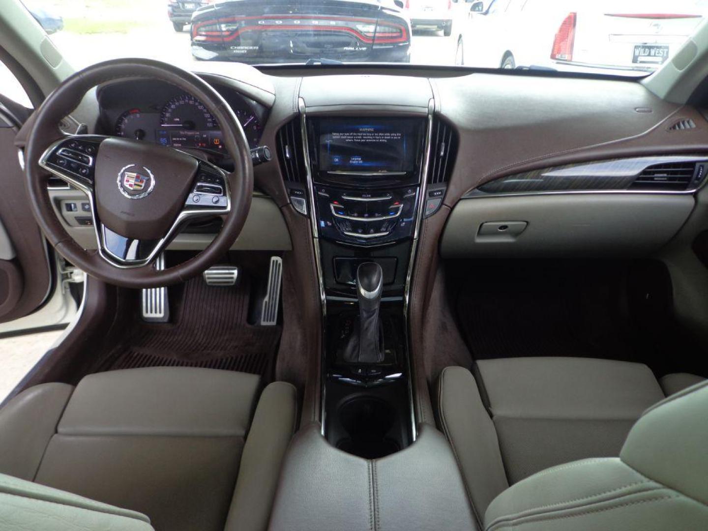 2013 WHITE CADILLAC ATS PREMIUM (1G6AL5S32D0) with an 3.6L engine, Automatic transmission, located at 6610 L St., Omaha, NE, 68117, (402) 731-7800, 41.212872, -96.014702 - THIS VEHICLE HAS A CLEAN TITLE WITH A FREE CARFAX PROVIDED! SHARP PREMIUM MODEL WITH A CLEAN CARFAX, LOW MILEAGE, NAV, SUNROOF, NEWER TIRES AND MUCH MORE! *****We have found that most customers do the majority of their shopping online before visiting a dealership. For this reason we feel it ne - Photo#14