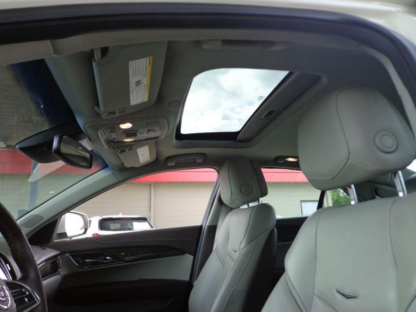 2013 WHITE CADILLAC ATS PREMIUM (1G6AL5S32D0) with an 3.6L engine, Automatic transmission, located at 6610 L St., Omaha, NE, 68117, (402) 731-7800, 41.212872, -96.014702 - THIS VEHICLE HAS A CLEAN TITLE WITH A FREE CARFAX PROVIDED! SHARP PREMIUM MODEL WITH A CLEAN CARFAX, LOW MILEAGE, NAV, SUNROOF, NEWER TIRES AND MUCH MORE! *****We have found that most customers do the majority of their shopping online before visiting a dealership. For this reason we feel it ne - Photo#15
