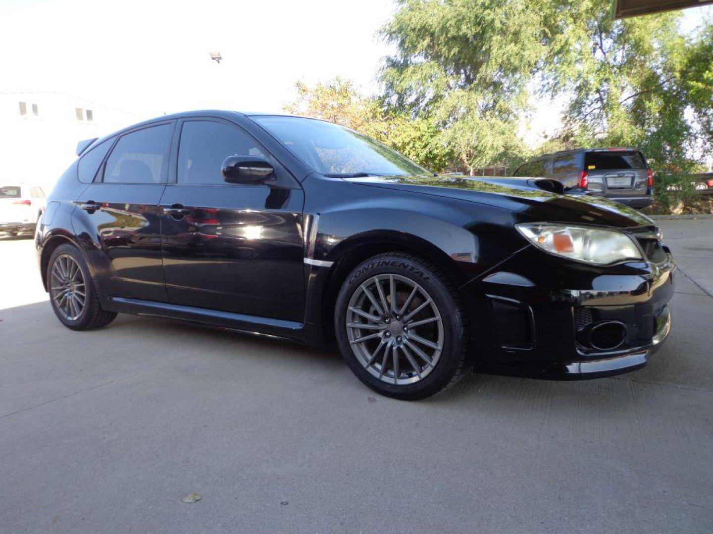 2012 BLACK SUBARU IMPREZA WRX (JF1GR7E69CG) with an 2.5L engine, 5-Speed Manual transmission, located at 6610 L St., Omaha, NE, 68117, (402) 731-7800, 41.212872, -96.014702 - THIS VEHICLE HAS A BEEN FULLY INSPECTED AND HAS A CLEAN TITLE WITH A FREE CARFAX REPORT PROVIDED 2-OWNER, CLEAN CARFAX, LOW MILEAGE AND NEWER TIRES! *****We have found that most customers do the majority of their shopping online before visiting a dealership. For this reason we feel it necessary - Photo#2
