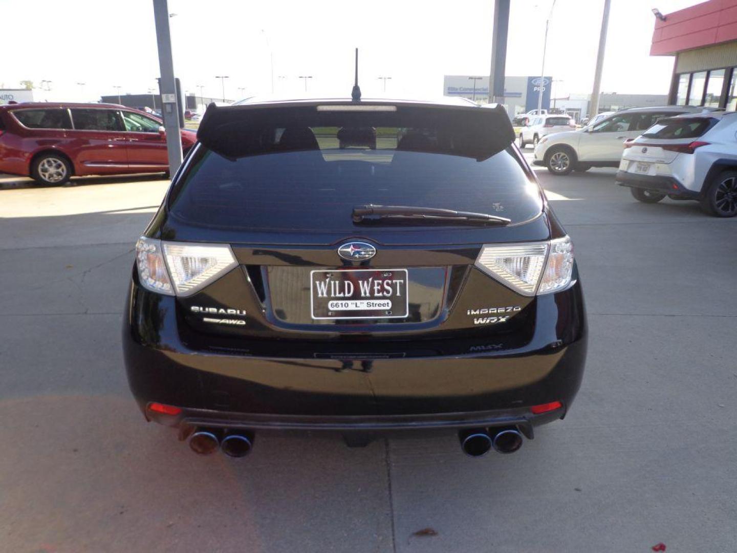 2012 BLACK SUBARU IMPREZA WRX (JF1GR7E69CG) with an 2.5L engine, 5-Speed Manual transmission, located at 6610 L St., Omaha, NE, 68117, (402) 731-7800, 41.212872, -96.014702 - THIS VEHICLE HAS A BEEN FULLY INSPECTED AND HAS A CLEAN TITLE WITH A FREE CARFAX REPORT PROVIDED 2-OWNER, CLEAN CARFAX, LOW MILEAGE AND NEWER TIRES! *****We have found that most customers do the majority of their shopping online before visiting a dealership. For this reason we feel it necessary - Photo#4