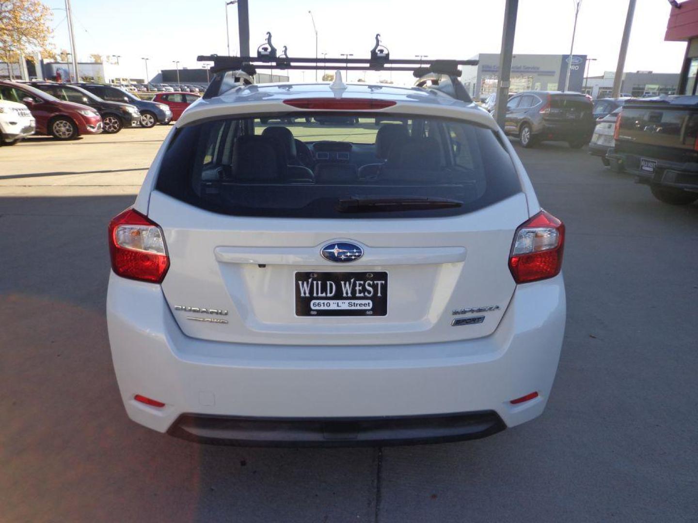 2016 WHITE SUBARU IMPREZA SPORT LIMITED (JF1GPAY63GH) with an 2.0L engine, Continuously Variable transmission, located at 6610 L St., Omaha, NE, 68117, (402) 731-7800, 41.212872, -96.014702 - THIS VEHICLE HAS A CLEAN TITLE WITH A FREE CARFAX PROVIDED! 1-OWNER, CLEAN CARFAX, LOW MILEAGE, HEATED LEATHER, SUNROOF, NAV, BACKUP CAM AND NEWER TIRES! *****We have found that most customers do the majority of their shopping online before visiting a dealership. For this reason we feel it neces - Photo#4