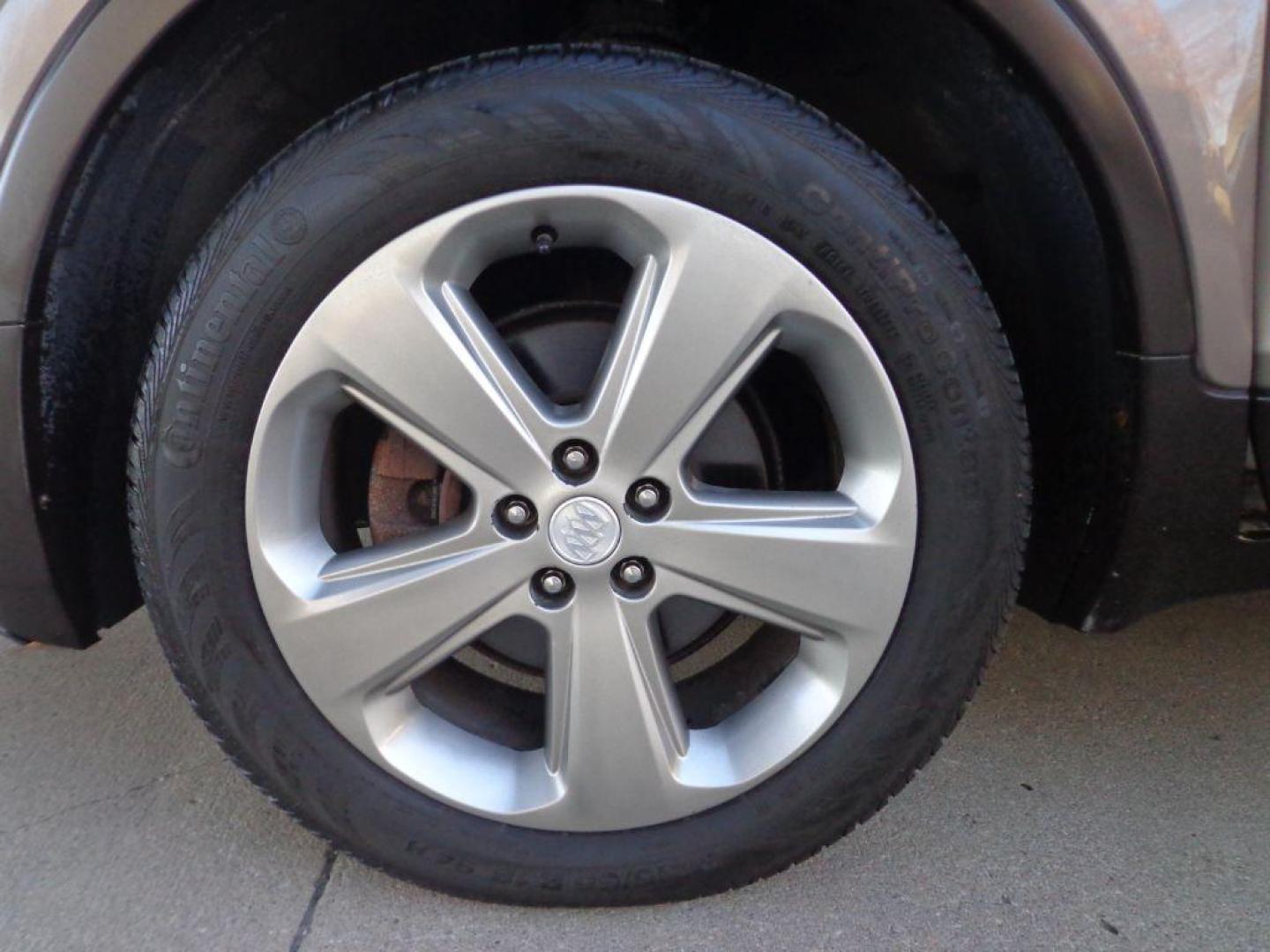 2014 BROWN BUICK ENCORE LEATHER (KL4CJGSB3EB) with an 1.4L engine, Automatic transmission, located at 6610 L St., Omaha, NE, 68117, (402) 731-7800, 41.212872, -96.014702 - THIS VEHICLE HAS A CLEAN TITLE WITH A FREE CARFAX PROVIDED! SHARP ENCORE LEATHER, AWD, A CLEAN CARFAX, LOW MILEAGE, SUNROOF, NAV, BACKUP CAM AND MUCH MORE! *****We have found that most customers do the majority of their shopping online before visiting a dealership. For this reason we feel it nec - Photo#7