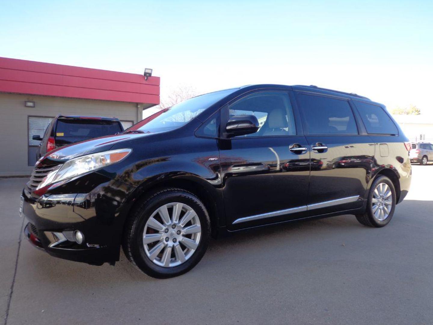 2017 BLACK TOYOTA SIENNA XLE (5TDDZ3DC2HS) with an 3.5L engine, Automatic transmission, located at 6610 L St., Omaha, NE, 68117, (402) 731-7800, 41.212872, -96.014702 - THIS VEHICLE HAS A CLEAN TITLE WITH A FREE CARFAX PROVIDED! SHARP LOW MILE XLE AWD LOADED WITH HEATED LEATHER, REAR CAPTAIN CHAIRS, SUNROOF, NAV, BACKUP CAM, BLIND SPOT ASSIST AND NEWER TIRES! *****We have found that most customers do the majority of their shopping online before visiting a deal - Photo#0