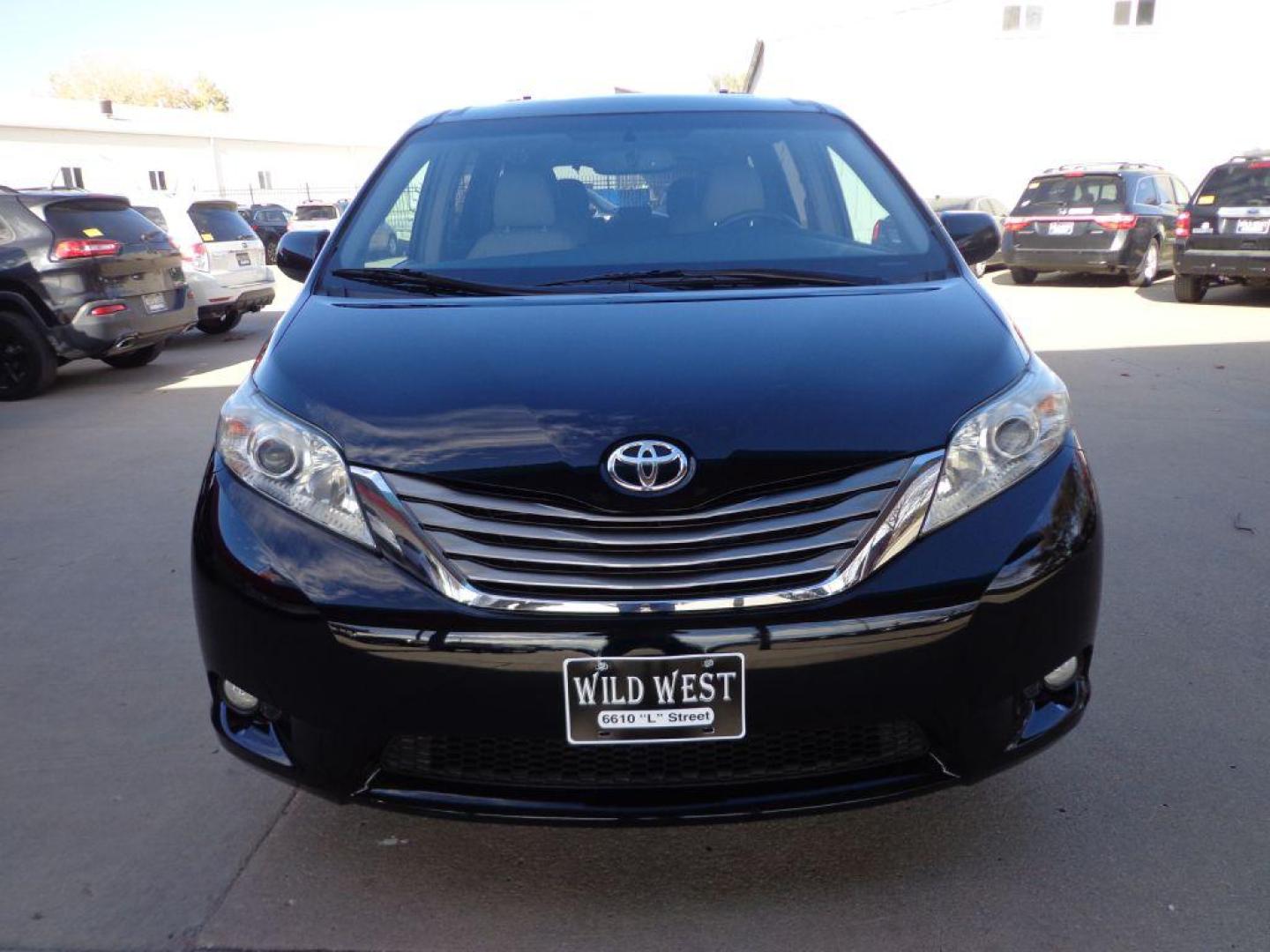 2017 BLACK TOYOTA SIENNA XLE (5TDDZ3DC2HS) with an 3.5L engine, Automatic transmission, located at 6610 L St., Omaha, NE, 68117, (402) 731-7800, 41.212872, -96.014702 - THIS VEHICLE HAS A CLEAN TITLE WITH A FREE CARFAX PROVIDED! SHARP LOW MILE XLE AWD LOADED WITH HEATED LEATHER, REAR CAPTAIN CHAIRS, SUNROOF, NAV, BACKUP CAM, BLIND SPOT ASSIST AND NEWER TIRES! *****We have found that most customers do the majority of their shopping online before visiting a deal - Photo#1