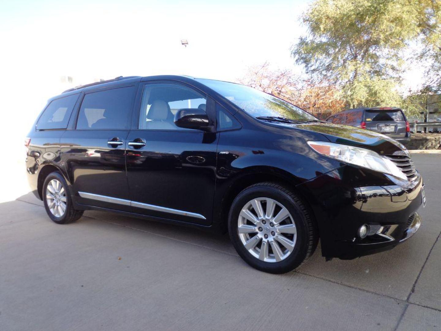 2017 BLACK TOYOTA SIENNA XLE (5TDDZ3DC2HS) with an 3.5L engine, Automatic transmission, located at 6610 L St., Omaha, NE, 68117, (402) 731-7800, 41.212872, -96.014702 - THIS VEHICLE HAS A CLEAN TITLE WITH A FREE CARFAX PROVIDED! SHARP LOW MILE XLE AWD LOADED WITH HEATED LEATHER, REAR CAPTAIN CHAIRS, SUNROOF, NAV, BACKUP CAM, BLIND SPOT ASSIST AND NEWER TIRES! *****We have found that most customers do the majority of their shopping online before visiting a deal - Photo#2