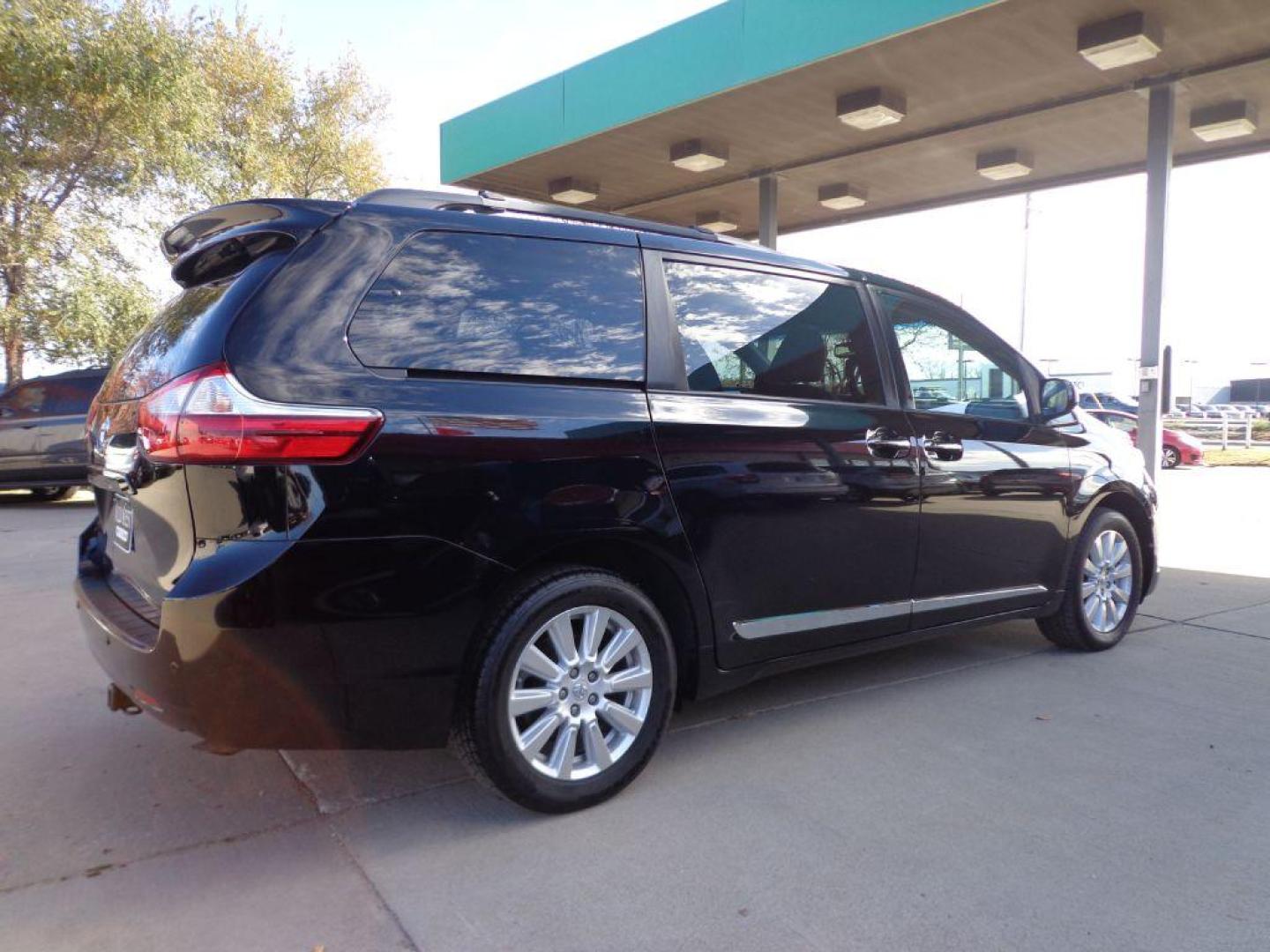 2017 BLACK TOYOTA SIENNA XLE (5TDDZ3DC2HS) with an 3.5L engine, Automatic transmission, located at 6610 L St., Omaha, NE, 68117, (402) 731-7800, 41.212872, -96.014702 - THIS VEHICLE HAS A CLEAN TITLE WITH A FREE CARFAX PROVIDED! SHARP LOW MILE XLE AWD LOADED WITH HEATED LEATHER, REAR CAPTAIN CHAIRS, SUNROOF, NAV, BACKUP CAM, BLIND SPOT ASSIST AND NEWER TIRES! *****We have found that most customers do the majority of their shopping online before visiting a deal - Photo#3