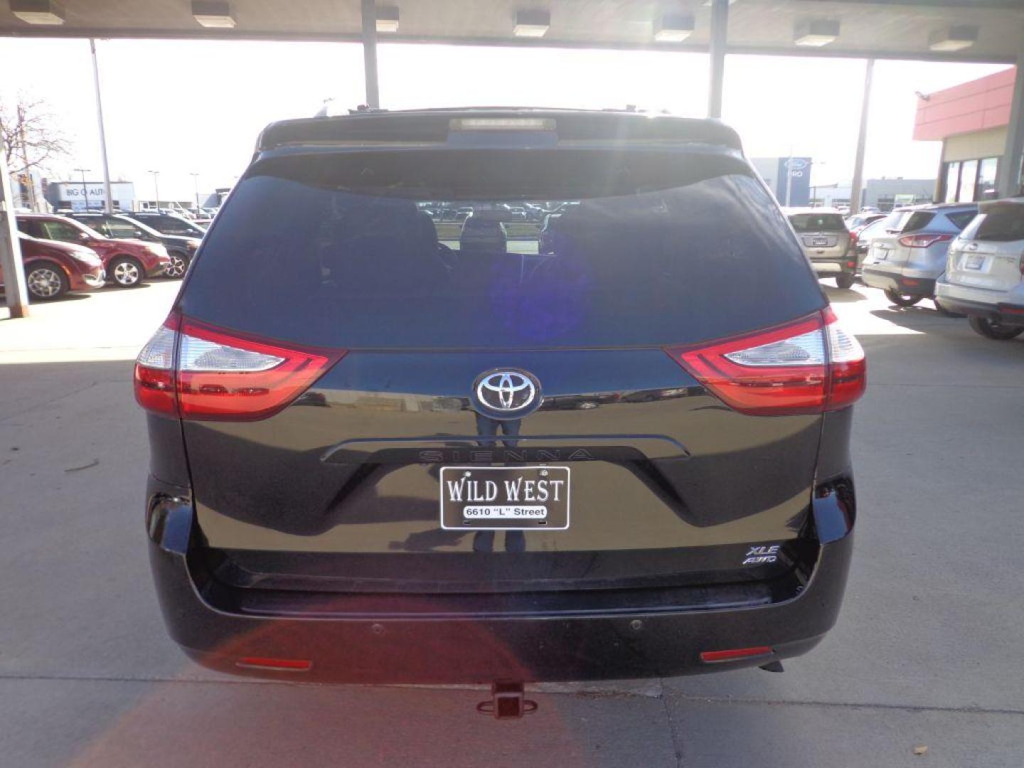 2017 BLACK TOYOTA SIENNA XLE (5TDDZ3DC2HS) with an 3.5L engine, Automatic transmission, located at 6610 L St., Omaha, NE, 68117, (402) 731-7800, 41.212872, -96.014702 - THIS VEHICLE HAS A CLEAN TITLE WITH A FREE CARFAX PROVIDED! SHARP LOW MILE XLE AWD LOADED WITH HEATED LEATHER, REAR CAPTAIN CHAIRS, SUNROOF, NAV, BACKUP CAM, BLIND SPOT ASSIST AND NEWER TIRES! *****We have found that most customers do the majority of their shopping online before visiting a deal - Photo#4
