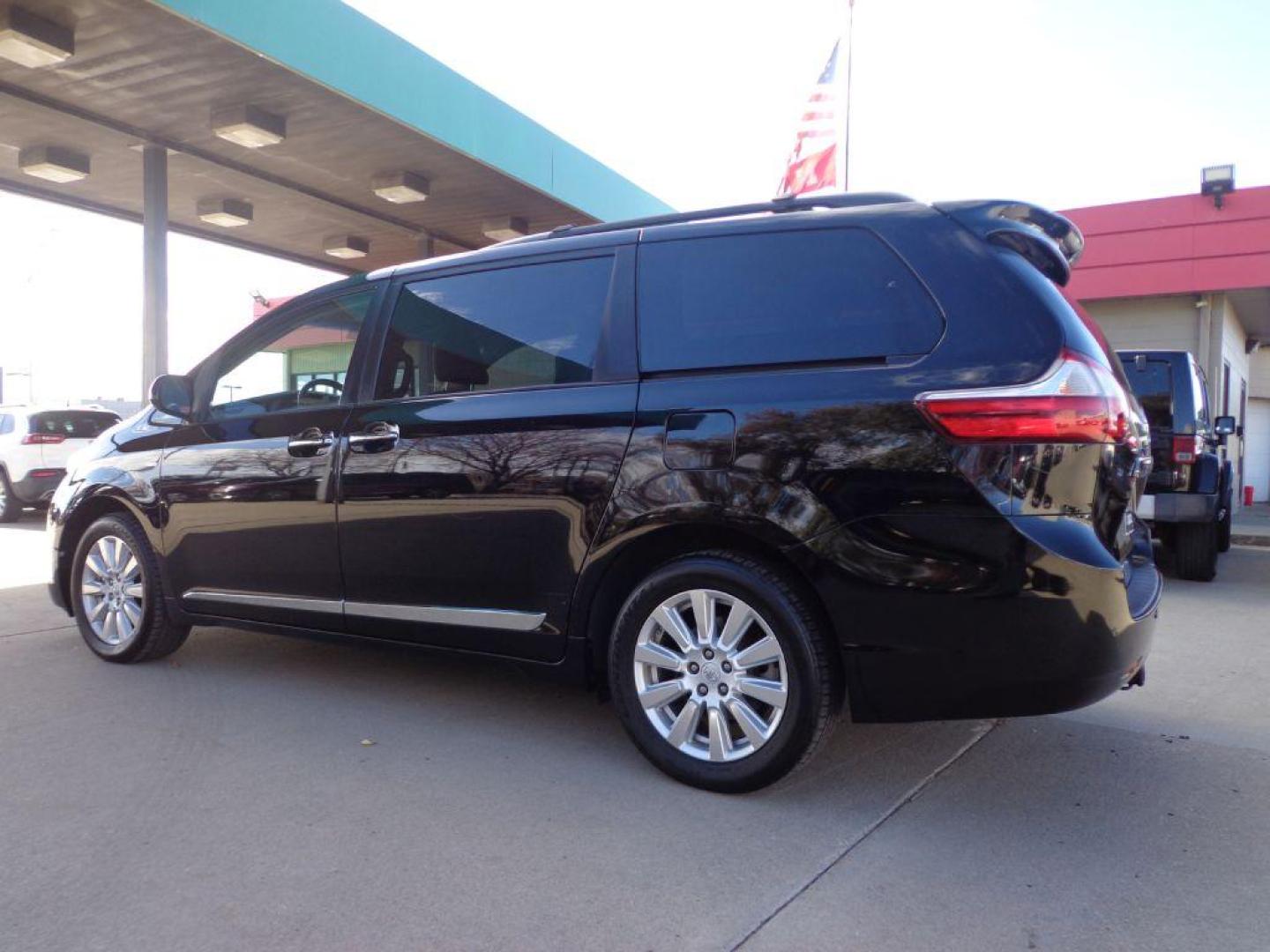 2017 BLACK TOYOTA SIENNA XLE (5TDDZ3DC2HS) with an 3.5L engine, Automatic transmission, located at 6610 L St., Omaha, NE, 68117, (402) 731-7800, 41.212872, -96.014702 - THIS VEHICLE HAS A CLEAN TITLE WITH A FREE CARFAX PROVIDED! SHARP LOW MILE XLE AWD LOADED WITH HEATED LEATHER, REAR CAPTAIN CHAIRS, SUNROOF, NAV, BACKUP CAM, BLIND SPOT ASSIST AND NEWER TIRES! *****We have found that most customers do the majority of their shopping online before visiting a deal - Photo#5