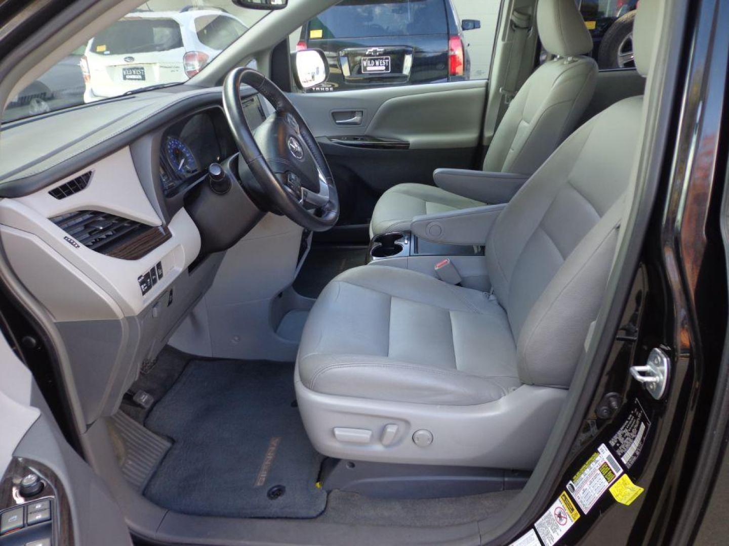 2017 BLACK TOYOTA SIENNA XLE (5TDDZ3DC2HS) with an 3.5L engine, Automatic transmission, located at 6610 L St., Omaha, NE, 68117, (402) 731-7800, 41.212872, -96.014702 - THIS VEHICLE HAS A CLEAN TITLE WITH A FREE CARFAX PROVIDED! SHARP LOW MILE XLE AWD LOADED WITH HEATED LEATHER, REAR CAPTAIN CHAIRS, SUNROOF, NAV, BACKUP CAM, BLIND SPOT ASSIST AND NEWER TIRES! *****We have found that most customers do the majority of their shopping online before visiting a deal - Photo#12