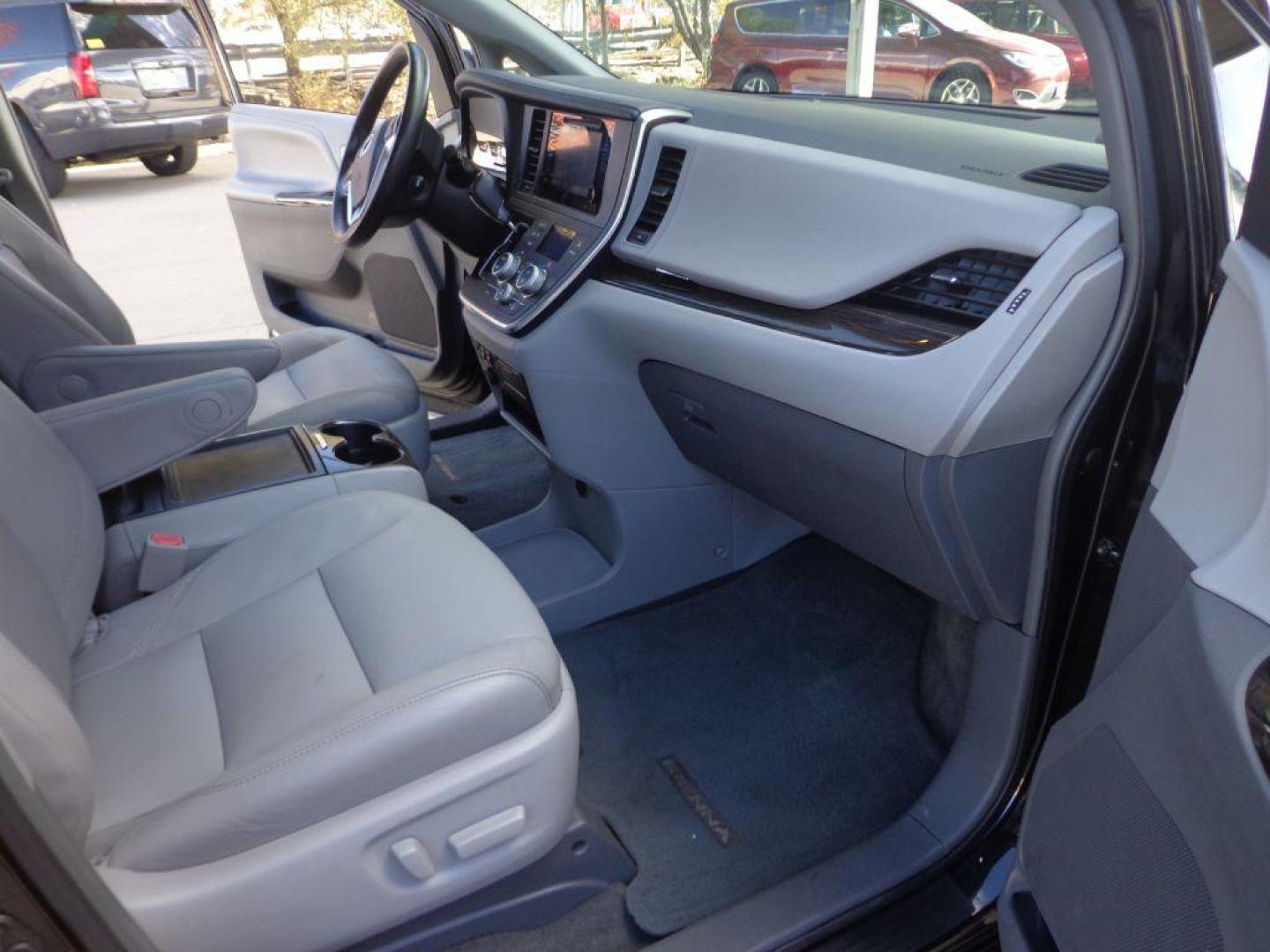 2017 BLACK TOYOTA SIENNA XLE (5TDDZ3DC2HS) with an 3.5L engine, Automatic transmission, located at 6610 L St., Omaha, NE, 68117, (402) 731-7800, 41.212872, -96.014702 - THIS VEHICLE HAS A CLEAN TITLE WITH A FREE CARFAX PROVIDED! SHARP LOW MILE XLE AWD LOADED WITH HEATED LEATHER, REAR CAPTAIN CHAIRS, SUNROOF, NAV, BACKUP CAM, BLIND SPOT ASSIST AND NEWER TIRES! *****We have found that most customers do the majority of their shopping online before visiting a deal - Photo#17