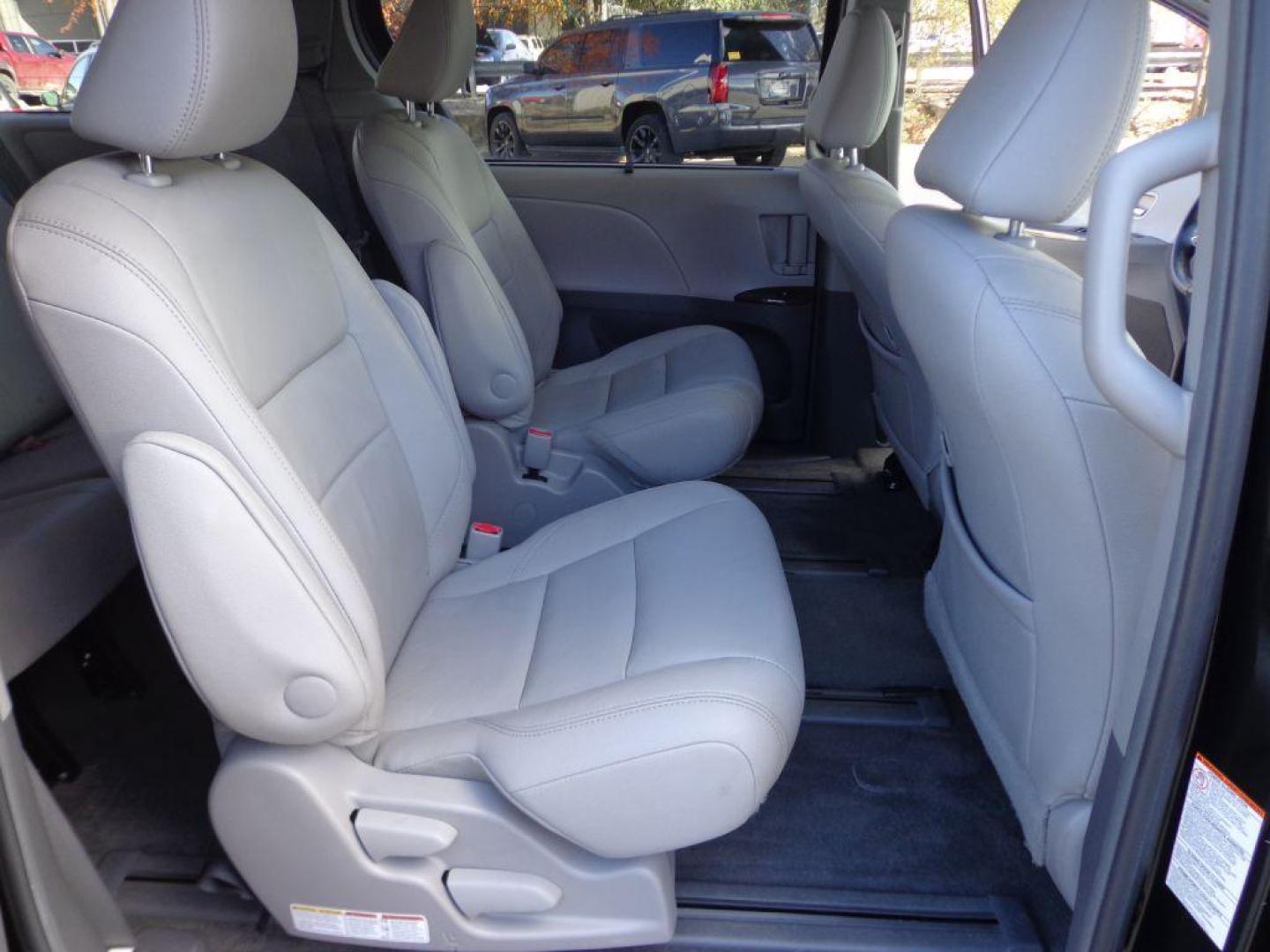 2017 BLACK TOYOTA SIENNA XLE (5TDDZ3DC2HS) with an 3.5L engine, Automatic transmission, located at 6610 L St., Omaha, NE, 68117, (402) 731-7800, 41.212872, -96.014702 - THIS VEHICLE HAS A CLEAN TITLE WITH A FREE CARFAX PROVIDED! SHARP LOW MILE XLE AWD LOADED WITH HEATED LEATHER, REAR CAPTAIN CHAIRS, SUNROOF, NAV, BACKUP CAM, BLIND SPOT ASSIST AND NEWER TIRES! *****We have found that most customers do the majority of their shopping online before visiting a deal - Photo#18