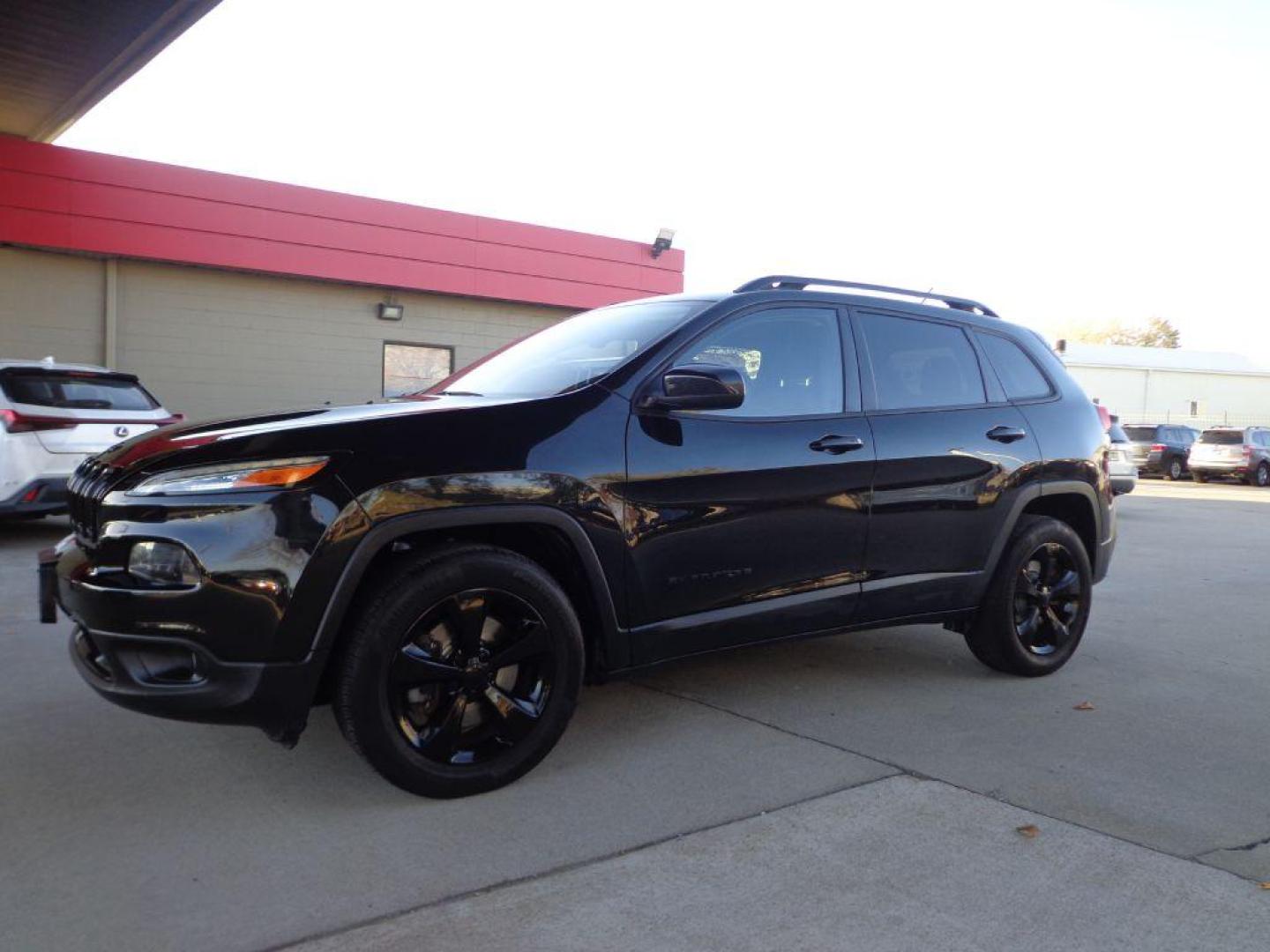 2015 BLACK JEEP CHEROKEE ALTITUDE (1C4PJMCS8FW) with an 3.2L engine, Automatic transmission, located at 6610 L St., Omaha, NE, 68117, (402) 731-7800, 41.212872, -96.014702 - THIS VEHICLE HAS A CLEAN TITLE WITH A FREE CARFAX PROVIDED! SHARP LOOKING LOW MILE JEEP WITH A CLEAN CARFAX, ALTITUDE BLACKOUT PACKAGE, V6, HEATED SEATS/ WHEEL, PANORAMIC ROOF AND NEWER TIRES! *****We have found that most customers do the majority of their shopping online before visiting a deale - Photo#0