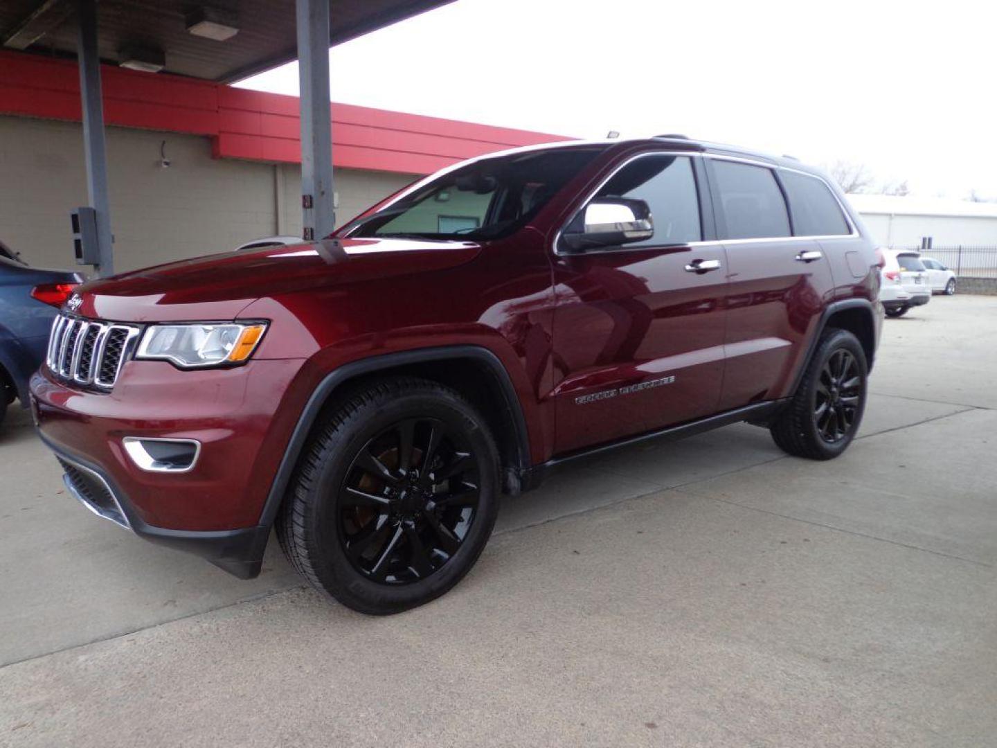 2017 MAROON JEEP GRAND CHEROKEE LIMITED (1C4RJFBGXHC) with an 3.6L engine, Automatic transmission, located at 6610 L St., Omaha, NE, 68117, (402) 731-7800, 41.212872, -96.014702 - THIS VEHICLE HAS A CLEAN TITLE WITH A FREE CARFAX PROVIDED! SHARP LIMITED PACKAGE WITH A CLEAN CARFAX, LOW MILEAGE, SUNROOF, NAV, BLIND SPOT ASSIST, HEATED SEATS/WHEEL AND A NICE SET OF MICHELINS! *****We have found that most customers do the majority of their shopping online before visiting a d - Photo#0